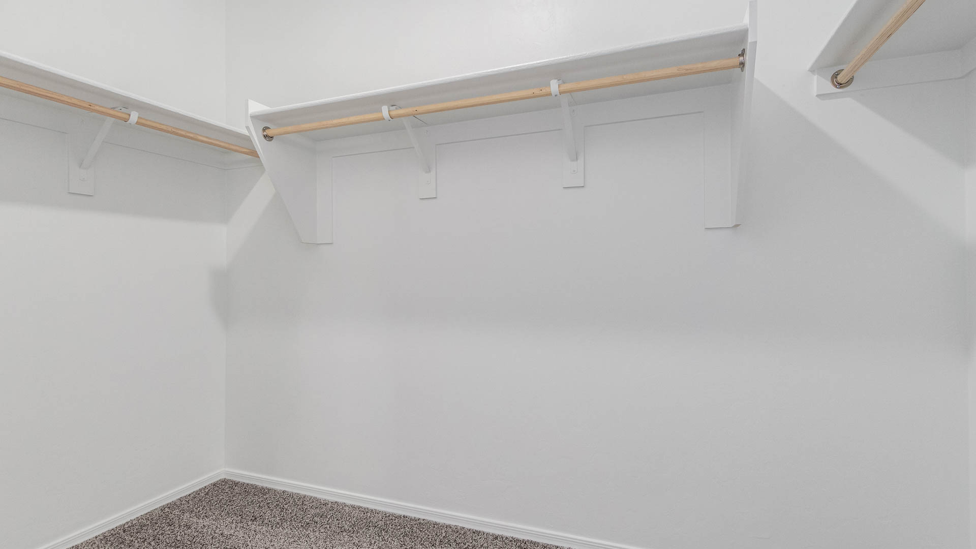 The Parker floor plan is one of the expansive new homes featured at The Oasis at Rocking K in Vail, Arizona. This vibrant community is nestled against the backdrop of the Rincon Mountains. The Parker stands out as a spacious single-story new home, offering 1,914 square feet of living space, making it the largest single-story floorplan available in this community.  The Parker is a reflection of elegance that defines The Oasis at Rocking K. The beautifully landscaped front yard, complete with an irrigation system, enhances the curb appeal, with a covered front porch.  Step into a well-planned layout that effortlessly balances functionality. The Parker features five bedrooms, including a private primary suite with a walk-in closet and en-suite bathroom. The additional bedrooms are thoughtfully situated to provide privacy and comfort, with easy access to two full bathrooms.  The heart of The Parker is the kitchen, which seamlessly connects to the dining room and great room. The kitchen is equipped with high-end finishes, including quartz countertops, shaker-style cabinets, and stainless-steel appliances. A generous pantry and plenty of cabinet space ensure that storage is never an issue.  The Parker includes a covered back patio, perfect for enjoying the tranquility of the surrounding landscape. Inside, the home features durable wood-look tile flooring in the main living areas, adding warmth and elegance to the space.  The Parker comes equipped with the Home is Connected® Smart Home package. This includes a smart thermostat, video doorbell, keyless entry, and more. Additionally, the home meets DOE Zero Energy Ready Home standards, with features like spray foam insulation and tankless water heaters, ensuring long-term savings and a reduced environmental footprint.  Living in The Oasis at Rocking K means enjoying a community rich in amenities. Whether you’re seeking a peaceful retreat or an active lifestyle, The Parker at The Oasis at Rocking K offers the perfect home base.