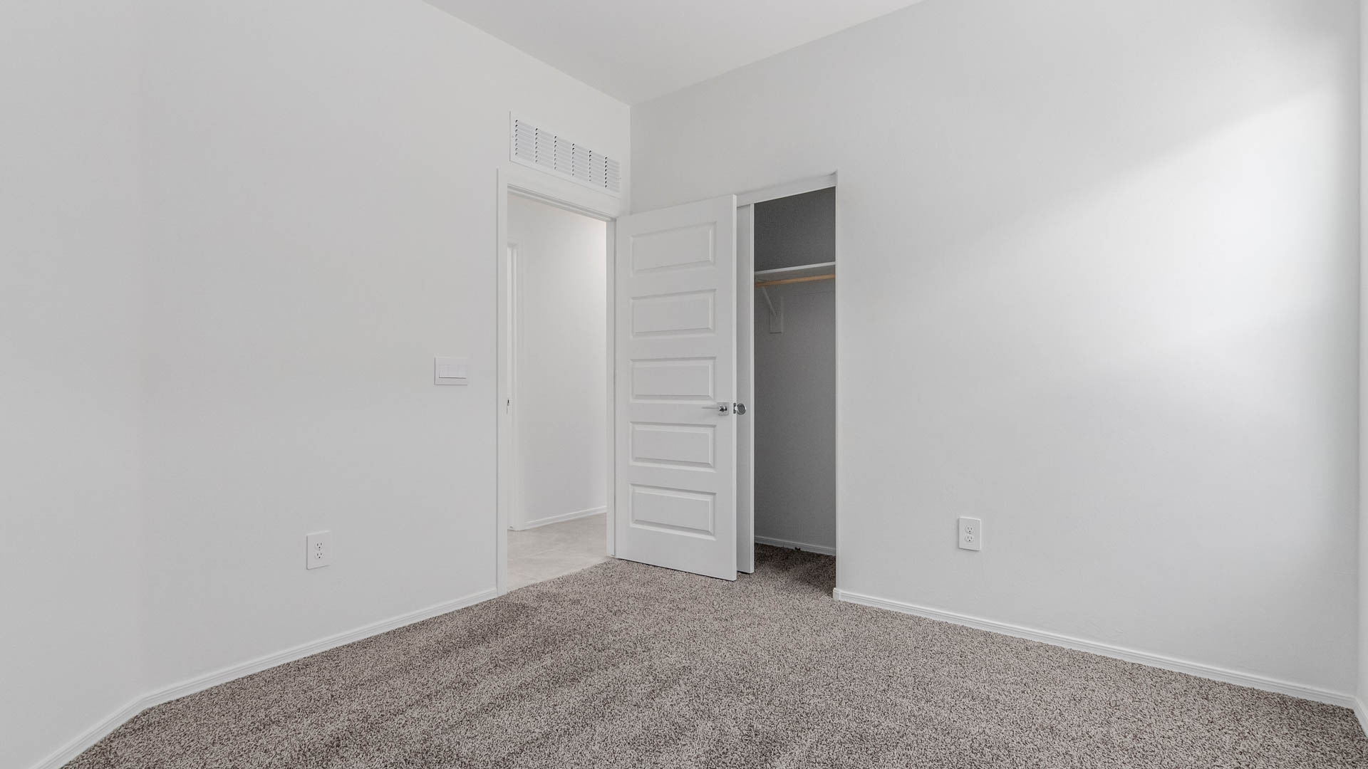 The Parker floor plan is one of the expansive new homes featured at The Oasis at Rocking K in Vail, Arizona. This vibrant community is nestled against the backdrop of the Rincon Mountains. The Parker stands out as a spacious single-story new home, offering 1,914 square feet of living space, making it the largest single-story floorplan available in this community.  The Parker is a reflection of elegance that defines The Oasis at Rocking K. The beautifully landscaped front yard, complete with an irrigation system, enhances the curb appeal, with a covered front porch.  Step into a well-planned layout that effortlessly balances functionality. The Parker features five bedrooms, including a private primary suite with a walk-in closet and en-suite bathroom. The additional bedrooms are thoughtfully situated to provide privacy and comfort, with easy access to two full bathrooms.  The heart of The Parker is the kitchen, which seamlessly connects to the dining room and great room. The kitchen is equipped with high-end finishes, including quartz countertops, shaker-style cabinets, and stainless-steel appliances. A generous pantry and plenty of cabinet space ensure that storage is never an issue.  The Parker includes a covered back patio, perfect for enjoying the tranquility of the surrounding landscape. Inside, the home features durable wood-look tile flooring in the main living areas, adding warmth and elegance to the space.  The Parker comes equipped with the Home is Connected® Smart Home package. This includes a smart thermostat, video doorbell, keyless entry, and more. Additionally, the home meets DOE Zero Energy Ready Home standards, with features like spray foam insulation and tankless water heaters, ensuring long-term savings and a reduced environmental footprint.  Living in The Oasis at Rocking K means enjoying a community rich in amenities. Whether you’re seeking a peaceful retreat or an active lifestyle, The Parker at The Oasis at Rocking K offers the perfect home base.