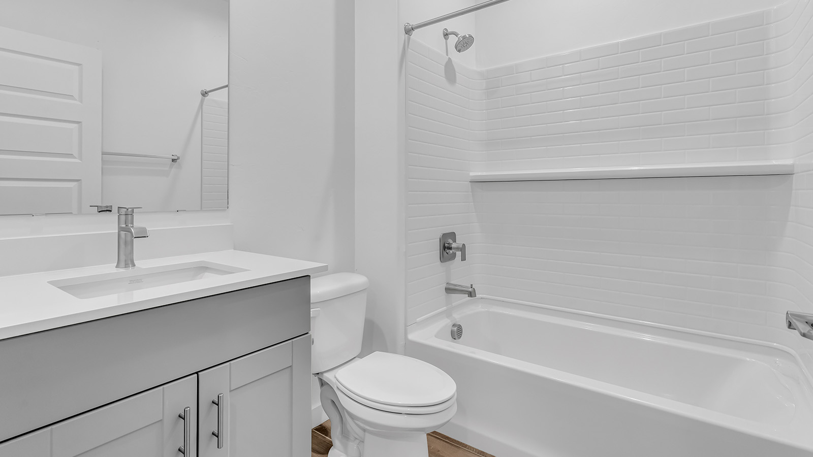 The Parker floor plan is one of the expansive new homes featured at The Oasis at Rocking K in Vail, Arizona. This vibrant community is nestled against the backdrop of the Rincon Mountains. The Parker stands out as a spacious single-story new home, offering 1,914 square feet of living space, making it the largest single-story floorplan available in this community.  The Parker is a reflection of elegance that defines The Oasis at Rocking K. The beautifully landscaped front yard, complete with an irrigation system, enhances the curb appeal, with a covered front porch.  Step into a well-planned layout that effortlessly balances functionality. The Parker features five bedrooms, including a private primary suite with a walk-in closet and en-suite bathroom. The additional bedrooms are thoughtfully situated to provide privacy and comfort, with easy access to two full bathrooms.  The heart of The Parker is the kitchen, which seamlessly connects to the dining room and great room. The kitchen is equipped with high-end finishes, including quartz countertops, shaker-style cabinets, and stainless-steel appliances. A generous pantry and plenty of cabinet space ensure that storage is never an issue.  The Parker includes a covered back patio, perfect for enjoying the tranquility of the surrounding landscape. Inside, the home features durable wood-look tile flooring in the main living areas, adding warmth and elegance to the space.  The Parker comes equipped with the Home is Connected® Smart Home package. This includes a smart thermostat, video doorbell, keyless entry, and more. Additionally, the home meets DOE Zero Energy Ready Home standards, with features like spray foam insulation and tankless water heaters, ensuring long-term savings and a reduced environmental footprint.  Living in The Oasis at Rocking K means enjoying a community rich in amenities. Whether you’re seeking a peaceful retreat or an active lifestyle, The Parker at The Oasis at Rocking K offers the perfect home base.