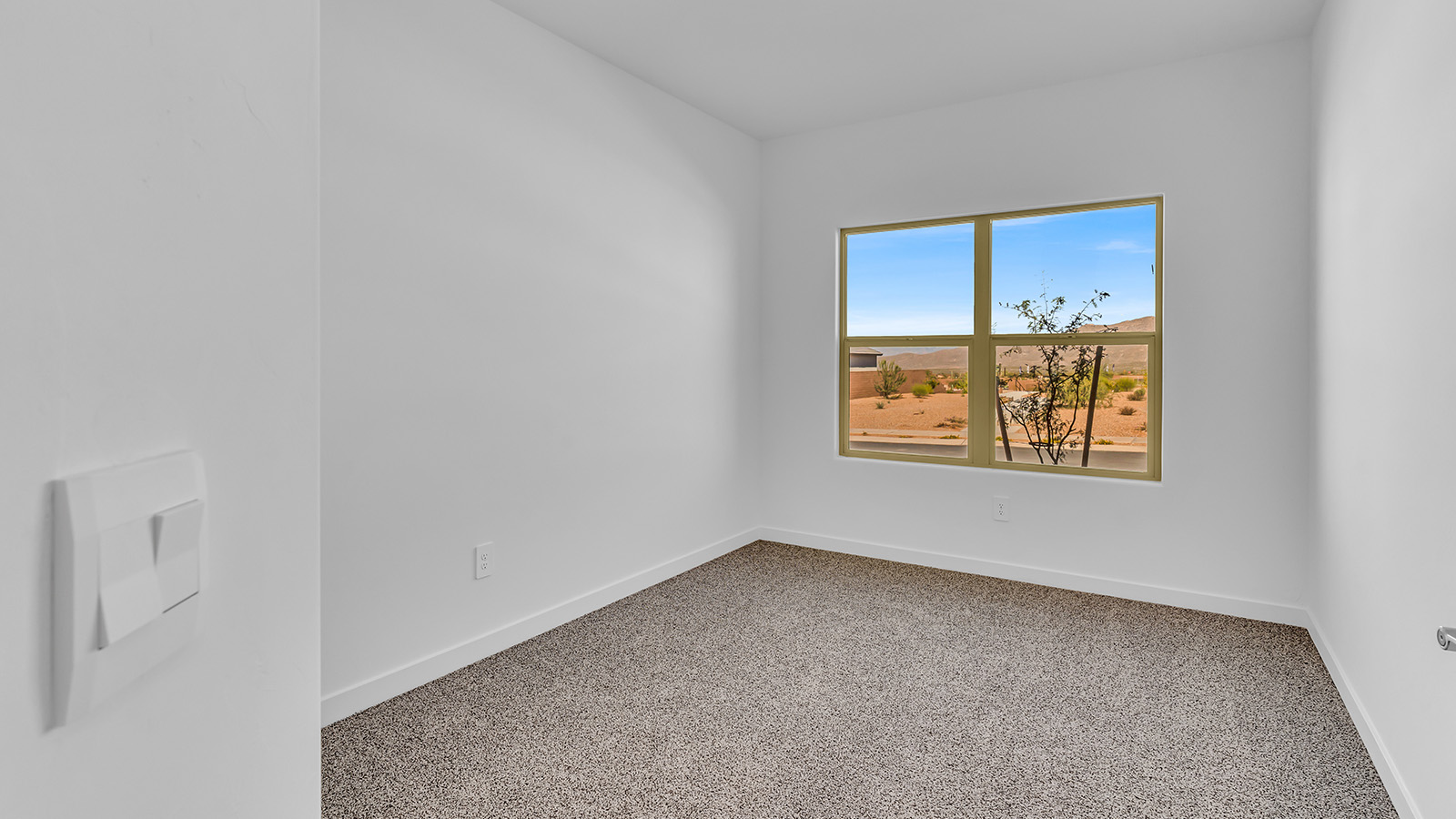 The Parker floor plan is one of the expansive new homes featured at The Oasis at Rocking K in Vail, Arizona. This vibrant community is nestled against the backdrop of the Rincon Mountains. The Parker stands out as a spacious single-story new home, offering 1,914 square feet of living space, making it the largest single-story floorplan available in this community.  The Parker is a reflection of elegance that defines The Oasis at Rocking K. The beautifully landscaped front yard, complete with an irrigation system, enhances the curb appeal, with a covered front porch.  Step into a well-planned layout that effortlessly balances functionality. The Parker features five bedrooms, including a private primary suite with a walk-in closet and en-suite bathroom. The additional bedrooms are thoughtfully situated to provide privacy and comfort, with easy access to two full bathrooms.  The heart of The Parker is the kitchen, which seamlessly connects to the dining room and great room. The kitchen is equipped with high-end finishes, including quartz countertops, shaker-style cabinets, and stainless-steel appliances. A generous pantry and plenty of cabinet space ensure that storage is never an issue.  The Parker includes a covered back patio, perfect for enjoying the tranquility of the surrounding landscape. Inside, the home features durable wood-look tile flooring in the main living areas, adding warmth and elegance to the space.  The Parker comes equipped with the Home is Connected® Smart Home package. This includes a smart thermostat, video doorbell, keyless entry, and more. Additionally, the home meets DOE Zero Energy Ready Home standards, with features like spray foam insulation and tankless water heaters, ensuring long-term savings and a reduced environmental footprint.  Living in The Oasis at Rocking K means enjoying a community rich in amenities. Whether you’re seeking a peaceful retreat or an active lifestyle, The Parker at The Oasis at Rocking K offers the perfect home base.