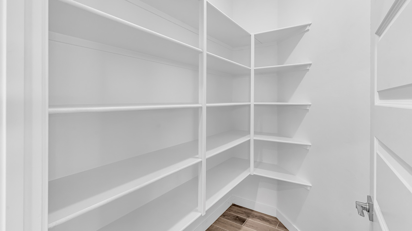 The Parker floor plan is one of the expansive new homes featured at The Oasis at Rocking K in Vail, Arizona. This vibrant community is nestled against the backdrop of the Rincon Mountains. The Parker stands out as a spacious single-story new home, offering 1,914 square feet of living space, making it the largest single-story floorplan available in this community.  The Parker is a reflection of elegance that defines The Oasis at Rocking K. The beautifully landscaped front yard, complete with an irrigation system, enhances the curb appeal, with a covered front porch.  Step into a well-planned layout that effortlessly balances functionality. The Parker features five bedrooms, including a private primary suite with a walk-in closet and en-suite bathroom. The additional bedrooms are thoughtfully situated to provide privacy and comfort, with easy access to two full bathrooms.  The heart of The Parker is the kitchen, which seamlessly connects to the dining room and great room. The kitchen is equipped with high-end finishes, including quartz countertops, shaker-style cabinets, and stainless-steel appliances. A generous pantry and plenty of cabinet space ensure that storage is never an issue.  The Parker includes a covered back patio, perfect for enjoying the tranquility of the surrounding landscape. Inside, the home features durable wood-look tile flooring in the main living areas, adding warmth and elegance to the space.  The Parker comes equipped with the Home is Connected® Smart Home package. This includes a smart thermostat, video doorbell, keyless entry, and more. Additionally, the home meets DOE Zero Energy Ready Home standards, with features like spray foam insulation and tankless water heaters, ensuring long-term savings and a reduced environmental footprint.  Living in The Oasis at Rocking K means enjoying a community rich in amenities. Whether you’re seeking a peaceful retreat or an active lifestyle, The Parker at The Oasis at Rocking K offers the perfect home base.