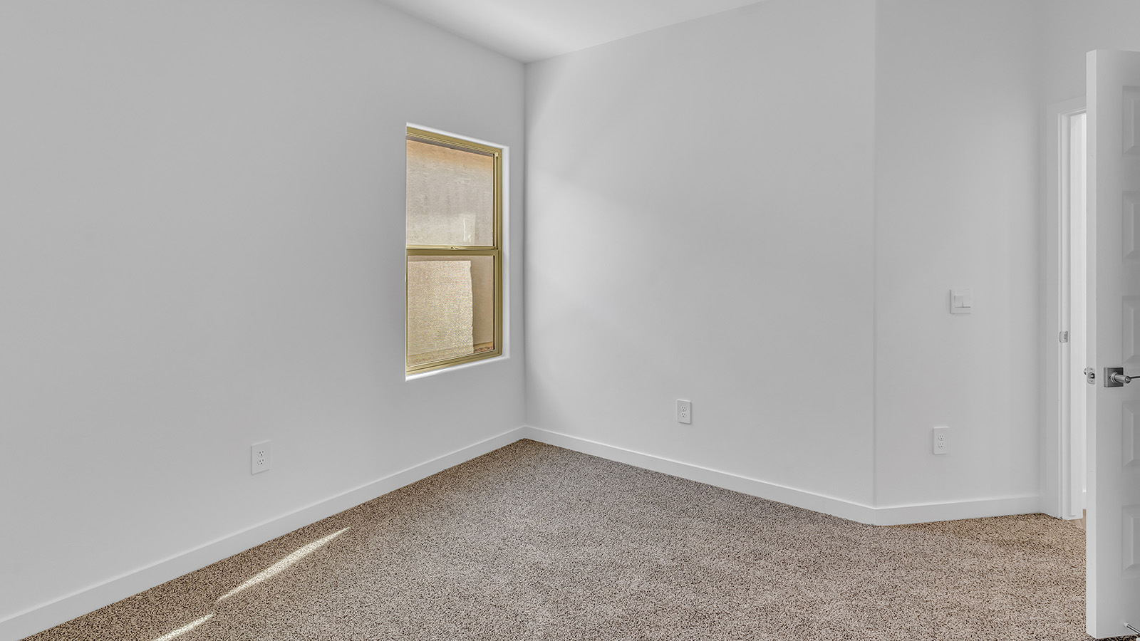 The Parker floor plan is one of the expansive new homes featured at The Oasis at Rocking K in Vail, Arizona. This vibrant community is nestled against the backdrop of the Rincon Mountains. The Parker stands out as a spacious single-story new home, offering 1,914 square feet of living space, making it the largest single-story floorplan available in this community.  The Parker is a reflection of elegance that defines The Oasis at Rocking K. The beautifully landscaped front yard, complete with an irrigation system, enhances the curb appeal, with a covered front porch.  Step into a well-planned layout that effortlessly balances functionality. The Parker features five bedrooms, including a private primary suite with a walk-in closet and en-suite bathroom. The additional bedrooms are thoughtfully situated to provide privacy and comfort, with easy access to two full bathrooms.  The heart of The Parker is the kitchen, which seamlessly connects to the dining room and great room. The kitchen is equipped with high-end finishes, including quartz countertops, shaker-style cabinets, and stainless-steel appliances. A generous pantry and plenty of cabinet space ensure that storage is never an issue.  The Parker includes a covered back patio, perfect for enjoying the tranquility of the surrounding landscape. Inside, the home features durable wood-look tile flooring in the main living areas, adding warmth and elegance to the space.  The Parker comes equipped with the Home is Connected® Smart Home package. This includes a smart thermostat, video doorbell, keyless entry, and more. Additionally, the home meets DOE Zero Energy Ready Home standards, with features like spray foam insulation and tankless water heaters, ensuring long-term savings and a reduced environmental footprint.  Living in The Oasis at Rocking K means enjoying a community rich in amenities. Whether you’re seeking a peaceful retreat or an active lifestyle, The Parker at The Oasis at Rocking K offers the perfect home base.