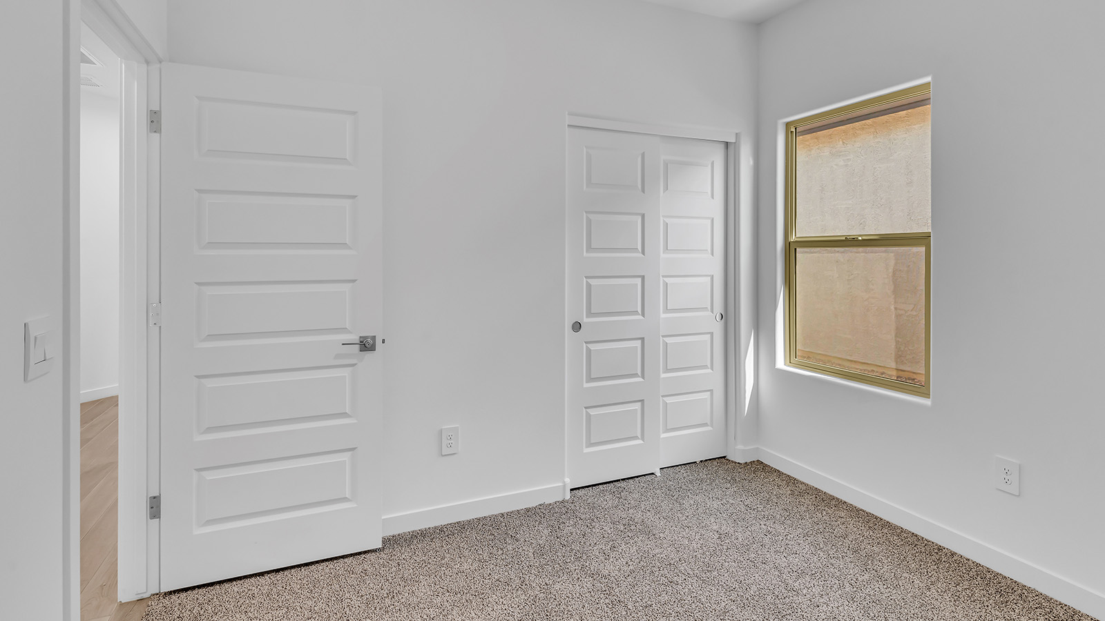 The Parker floor plan is one of the expansive new homes featured at The Oasis at Rocking K in Vail, Arizona. This vibrant community is nestled against the backdrop of the Rincon Mountains. The Parker stands out as a spacious single-story new home, offering 1,914 square feet of living space, making it the largest single-story floorplan available in this community.  The Parker is a reflection of elegance that defines The Oasis at Rocking K. The beautifully landscaped front yard, complete with an irrigation system, enhances the curb appeal, with a covered front porch.  Step into a well-planned layout that effortlessly balances functionality. The Parker features five bedrooms, including a private primary suite with a walk-in closet and en-suite bathroom. The additional bedrooms are thoughtfully situated to provide privacy and comfort, with easy access to two full bathrooms.  The heart of The Parker is the kitchen, which seamlessly connects to the dining room and great room. The kitchen is equipped with high-end finishes, including quartz countertops, shaker-style cabinets, and stainless-steel appliances. A generous pantry and plenty of cabinet space ensure that storage is never an issue.  The Parker includes a covered back patio, perfect for enjoying the tranquility of the surrounding landscape. Inside, the home features durable wood-look tile flooring in the main living areas, adding warmth and elegance to the space.  The Parker comes equipped with the Home is Connected® Smart Home package. This includes a smart thermostat, video doorbell, keyless entry, and more. Additionally, the home meets DOE Zero Energy Ready Home standards, with features like spray foam insulation and tankless water heaters, ensuring long-term savings and a reduced environmental footprint.  Living in The Oasis at Rocking K means enjoying a community rich in amenities. Whether you’re seeking a peaceful retreat or an active lifestyle, The Parker at The Oasis at Rocking K offers the perfect home base.