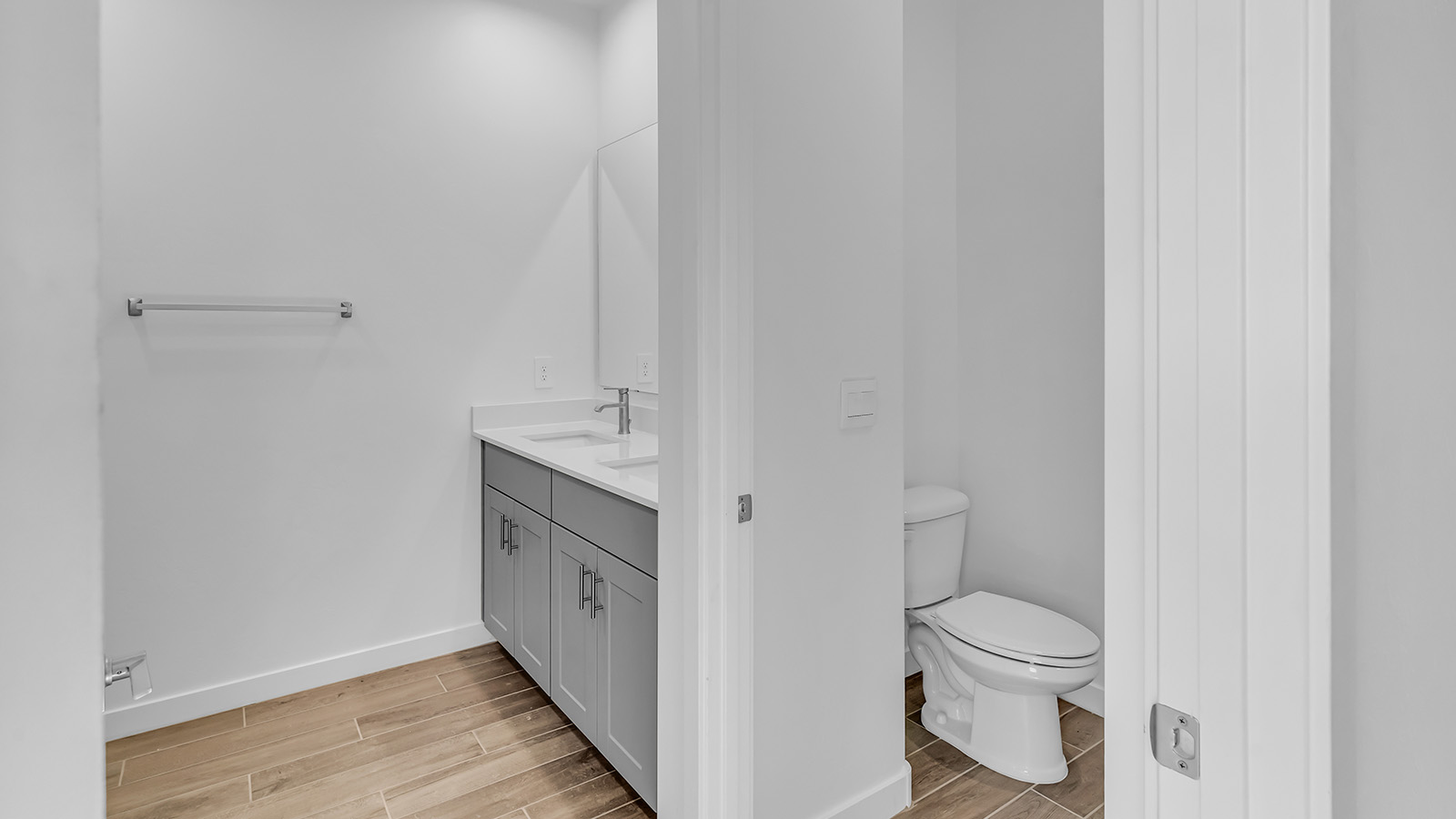 The Parker floor plan is one of the expansive new homes featured at The Oasis at Rocking K in Vail, Arizona. This vibrant community is nestled against the backdrop of the Rincon Mountains. The Parker stands out as a spacious single-story new home, offering 1,914 square feet of living space, making it the largest single-story floorplan available in this community.  The Parker is a reflection of elegance that defines The Oasis at Rocking K. The beautifully landscaped front yard, complete with an irrigation system, enhances the curb appeal, with a covered front porch.  Step into a well-planned layout that effortlessly balances functionality. The Parker features five bedrooms, including a private primary suite with a walk-in closet and en-suite bathroom. The additional bedrooms are thoughtfully situated to provide privacy and comfort, with easy access to two full bathrooms.  The heart of The Parker is the kitchen, which seamlessly connects to the dining room and great room. The kitchen is equipped with high-end finishes, including quartz countertops, shaker-style cabinets, and stainless-steel appliances. A generous pantry and plenty of cabinet space ensure that storage is never an issue.  The Parker includes a covered back patio, perfect for enjoying the tranquility of the surrounding landscape. Inside, the home features durable wood-look tile flooring in the main living areas, adding warmth and elegance to the space.  The Parker comes equipped with the Home is Connected® Smart Home package. This includes a smart thermostat, video doorbell, keyless entry, and more. Additionally, the home meets DOE Zero Energy Ready Home standards, with features like spray foam insulation and tankless water heaters, ensuring long-term savings and a reduced environmental footprint.  Living in The Oasis at Rocking K means enjoying a community rich in amenities. Whether you’re seeking a peaceful retreat or an active lifestyle, The Parker at The Oasis at Rocking K offers the perfect home base.