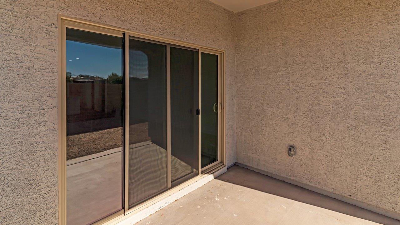 The Parker floor plan is one of the expansive new homes featured at The Oasis at Rocking K in Vail, Arizona. This vibrant community is nestled against the backdrop of the Rincon Mountains. The Parker stands out as a spacious single-story new home, offering 1,914 square feet of living space, making it the largest single-story floorplan available in this community.  The Parker is a reflection of elegance that defines The Oasis at Rocking K. The beautifully landscaped front yard, complete with an irrigation system, enhances the curb appeal, with a covered front porch.  Step into a well-planned layout that effortlessly balances functionality. The Parker features five bedrooms, including a private primary suite with a walk-in closet and en-suite bathroom. The additional bedrooms are thoughtfully situated to provide privacy and comfort, with easy access to two full bathrooms.  The heart of The Parker is the kitchen, which seamlessly connects to the dining room and great room. The kitchen is equipped with high-end finishes, including quartz countertops, shaker-style cabinets, and stainless-steel appliances. A generous pantry and plenty of cabinet space ensure that storage is never an issue.  The Parker includes a covered back patio, perfect for enjoying the tranquility of the surrounding landscape. Inside, the home features durable wood-look tile flooring in the main living areas, adding warmth and elegance to the space.  The Parker comes equipped with the Home is Connected® Smart Home package. This includes a smart thermostat, video doorbell, keyless entry, and more. Additionally, the home meets DOE Zero Energy Ready Home standards, with features like spray foam insulation and tankless water heaters, ensuring long-term savings and a reduced environmental footprint.  Living in The Oasis at Rocking K means enjoying a community rich in amenities. Whether you’re seeking a peaceful retreat or an active lifestyle, The Parker at The Oasis at Rocking K offers the perfect home base.