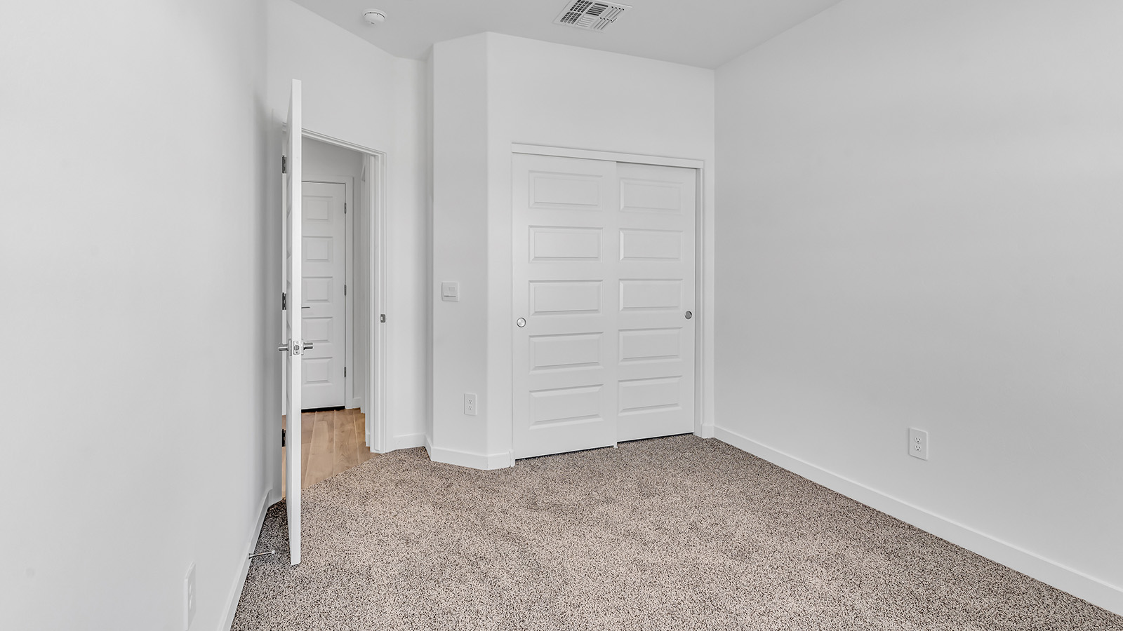 The Parker floor plan is one of the expansive new homes featured at The Oasis at Rocking K in Vail, Arizona. This vibrant community is nestled against the backdrop of the Rincon Mountains. The Parker stands out as a spacious single-story new home, offering 1,914 square feet of living space, making it the largest single-story floorplan available in this community.  The Parker is a reflection of elegance that defines The Oasis at Rocking K. The beautifully landscaped front yard, complete with an irrigation system, enhances the curb appeal, with a covered front porch.  Step into a well-planned layout that effortlessly balances functionality. The Parker features five bedrooms, including a private primary suite with a walk-in closet and en-suite bathroom. The additional bedrooms are thoughtfully situated to provide privacy and comfort, with easy access to two full bathrooms.  The heart of The Parker is the kitchen, which seamlessly connects to the dining room and great room. The kitchen is equipped with high-end finishes, including quartz countertops, shaker-style cabinets, and stainless-steel appliances. A generous pantry and plenty of cabinet space ensure that storage is never an issue.  The Parker includes a covered back patio, perfect for enjoying the tranquility of the surrounding landscape. Inside, the home features durable wood-look tile flooring in the main living areas, adding warmth and elegance to the space.  The Parker comes equipped with the Home is Connected® Smart Home package. This includes a smart thermostat, video doorbell, keyless entry, and more. Additionally, the home meets DOE Zero Energy Ready Home standards, with features like spray foam insulation and tankless water heaters, ensuring long-term savings and a reduced environmental footprint.  Living in The Oasis at Rocking K means enjoying a community rich in amenities. Whether you’re seeking a peaceful retreat or an active lifestyle, The Parker at The Oasis at Rocking K offers the perfect home base.