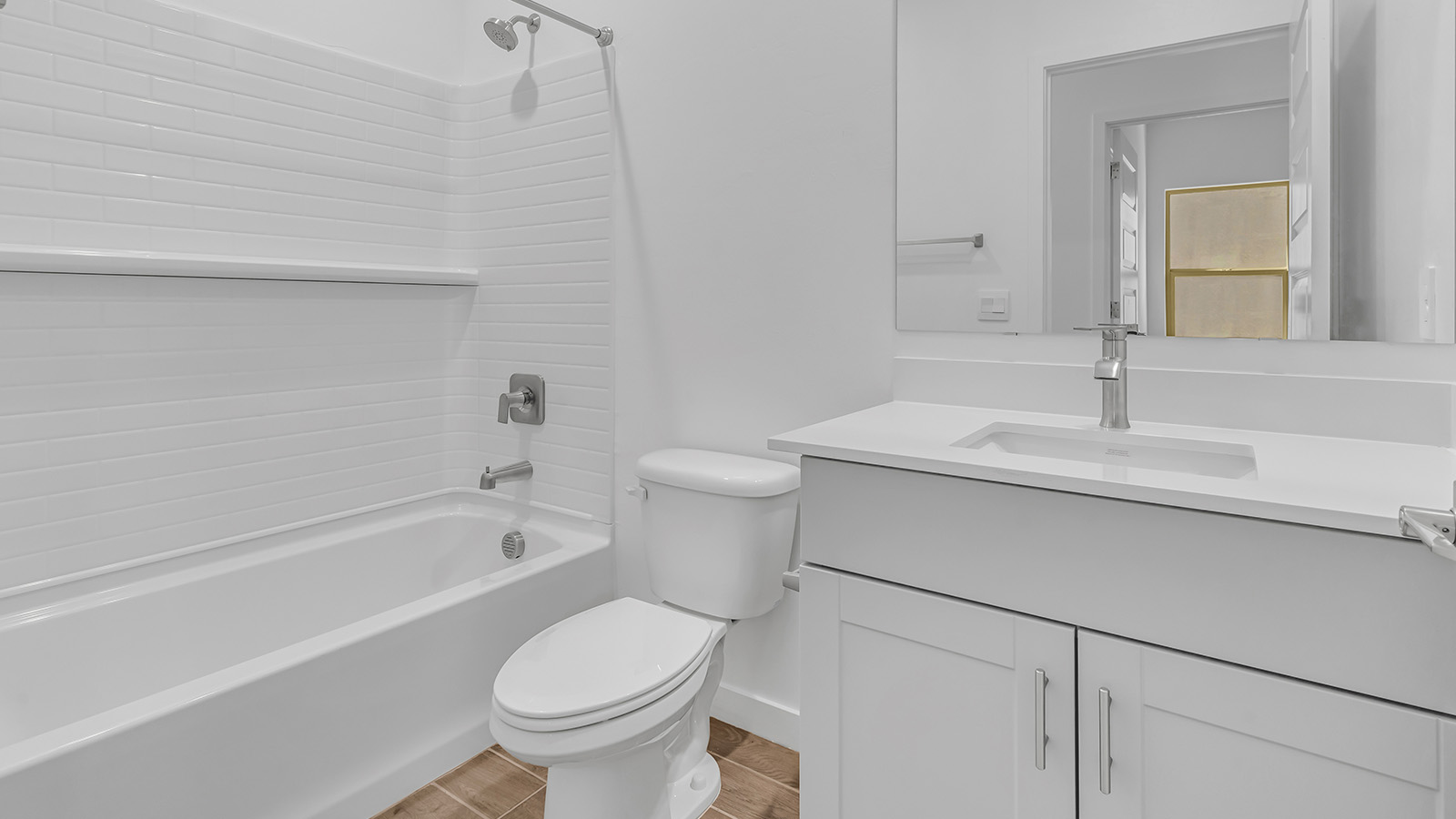 The Parker floor plan is one of the expansive new homes featured at The Oasis at Rocking K in Vail, Arizona. This vibrant community is nestled against the backdrop of the Rincon Mountains. The Parker stands out as a spacious single-story new home, offering 1,914 square feet of living space, making it the largest single-story floorplan available in this community.  The Parker is a reflection of elegance that defines The Oasis at Rocking K. The beautifully landscaped front yard, complete with an irrigation system, enhances the curb appeal, with a covered front porch.  Step into a well-planned layout that effortlessly balances functionality. The Parker features five bedrooms, including a private primary suite with a walk-in closet and en-suite bathroom. The additional bedrooms are thoughtfully situated to provide privacy and comfort, with easy access to two full bathrooms.  The heart of The Parker is the kitchen, which seamlessly connects to the dining room and great room. The kitchen is equipped with high-end finishes, including quartz countertops, shaker-style cabinets, and stainless-steel appliances. A generous pantry and plenty of cabinet space ensure that storage is never an issue.  The Parker includes a covered back patio, perfect for enjoying the tranquility of the surrounding landscape. Inside, the home features durable wood-look tile flooring in the main living areas, adding warmth and elegance to the space.  The Parker comes equipped with the Home is Connected® Smart Home package. This includes a smart thermostat, video doorbell, keyless entry, and more. Additionally, the home meets DOE Zero Energy Ready Home standards, with features like spray foam insulation and tankless water heaters, ensuring long-term savings and a reduced environmental footprint.  Living in The Oasis at Rocking K means enjoying a community rich in amenities. Whether you’re seeking a peaceful retreat or an active lifestyle, The Parker at The Oasis at Rocking K offers the perfect home base.