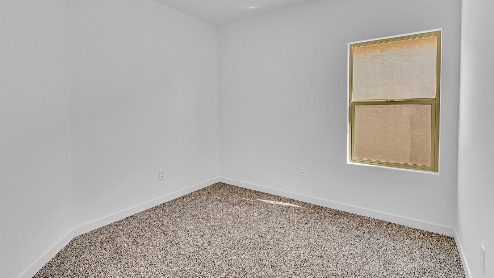 The Parker floor plan is one of the expansive new homes featured at The Oasis at Rocking K in Vail, Arizona. This vibrant community is nestled against the backdrop of the Rincon Mountains. The Parker stands out as a spacious single-story new home, offering 1,914 square feet of living space, making it the largest single-story floorplan available in this community.  The Parker is a reflection of elegance that defines The Oasis at Rocking K. The beautifully landscaped front yard, complete with an irrigation system, enhances the curb appeal, with a covered front porch.  Step into a well-planned layout that effortlessly balances functionality. The Parker features five bedrooms, including a private primary suite with a walk-in closet and en-suite bathroom. The additional bedrooms are thoughtfully situated to provide privacy and comfort, with easy access to two full bathrooms.  The heart of The Parker is the kitchen, which seamlessly connects to the dining room and great room. The kitchen is equipped with high-end finishes, including quartz countertops, shaker-style cabinets, and stainless-steel appliances. A generous pantry and plenty of cabinet space ensure that storage is never an issue.  The Parker includes a covered back patio, perfect for enjoying the tranquility of the surrounding landscape. Inside, the home features durable wood-look tile flooring in the main living areas, adding warmth and elegance to the space.  The Parker comes equipped with the Home is Connected® Smart Home package. This includes a smart thermostat, video doorbell, keyless entry, and more. Additionally, the home meets DOE Zero Energy Ready Home standards, with features like spray foam insulation and tankless water heaters, ensuring long-term savings and a reduced environmental footprint.  Living in The Oasis at Rocking K means enjoying a community rich in amenities. Whether you’re seeking a peaceful retreat or an active lifestyle, The Parker at The Oasis at Rocking K offers the perfect home base.