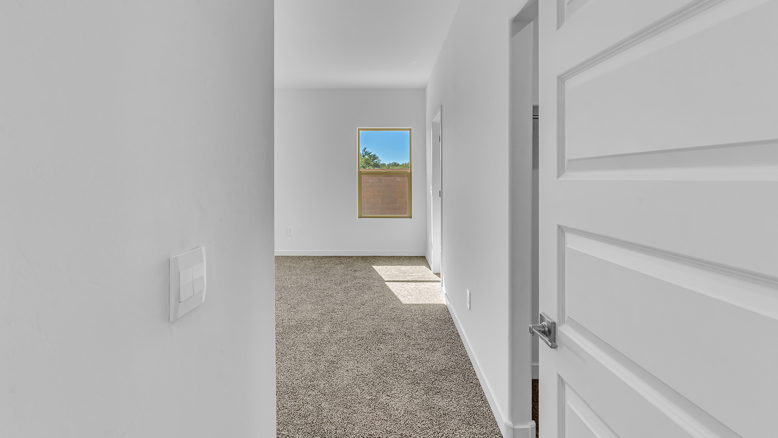 The Parker floor plan is one of the expansive new homes featured at The Oasis at Rocking K in Vail, Arizona. This vibrant community is nestled against the backdrop of the Rincon Mountains. The Parker stands out as a spacious single-story new home, offering 1,914 square feet of living space, making it the largest single-story floorplan available in this community.  The Parker is a reflection of elegance that defines The Oasis at Rocking K. The beautifully landscaped front yard, complete with an irrigation system, enhances the curb appeal, with a covered front porch.  Step into a well-planned layout that effortlessly balances functionality. The Parker features five bedrooms, including a private primary suite with a walk-in closet and en-suite bathroom. The additional bedrooms are thoughtfully situated to provide privacy and comfort, with easy access to two full bathrooms.  The heart of The Parker is the kitchen, which seamlessly connects to the dining room and great room. The kitchen is equipped with high-end finishes, including quartz countertops, shaker-style cabinets, and stainless-steel appliances. A generous pantry and plenty of cabinet space ensure that storage is never an issue.  The Parker includes a covered back patio, perfect for enjoying the tranquility of the surrounding landscape. Inside, the home features durable wood-look tile flooring in the main living areas, adding warmth and elegance to the space.  The Parker comes equipped with the Home is Connected® Smart Home package. This includes a smart thermostat, video doorbell, keyless entry, and more. Additionally, the home meets DOE Zero Energy Ready Home standards, with features like spray foam insulation and tankless water heaters, ensuring long-term savings and a reduced environmental footprint.  Living in The Oasis at Rocking K means enjoying a community rich in amenities. Whether you’re seeking a peaceful retreat or an active lifestyle, The Parker at The Oasis at Rocking K offers the perfect home base.