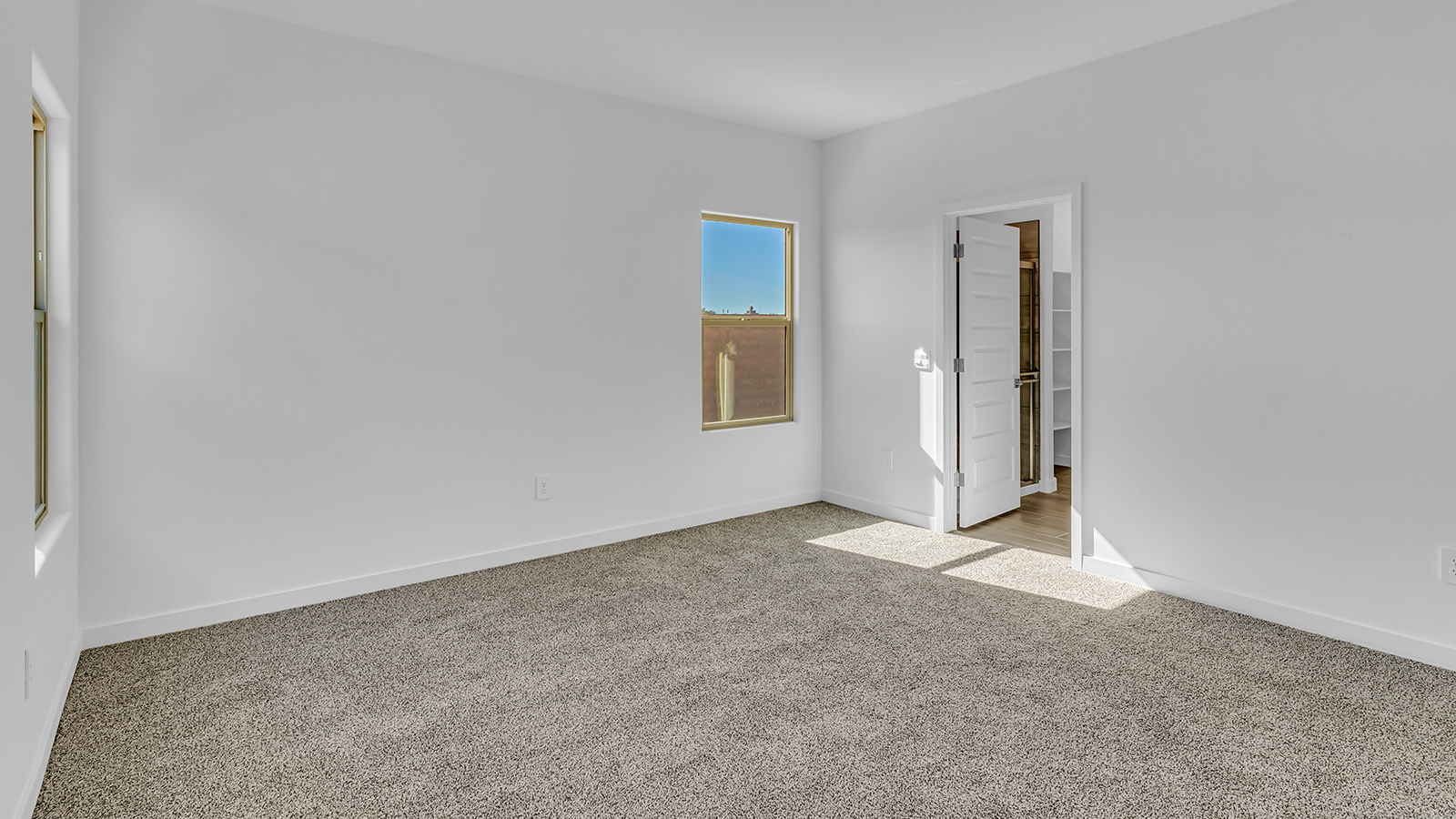 The Parker floor plan is one of the expansive new homes featured at The Oasis at Rocking K in Vail, Arizona. This vibrant community is nestled against the backdrop of the Rincon Mountains. The Parker stands out as a spacious single-story new home, offering 1,914 square feet of living space, making it the largest single-story floorplan available in this community.  The Parker is a reflection of elegance that defines The Oasis at Rocking K. The beautifully landscaped front yard, complete with an irrigation system, enhances the curb appeal, with a covered front porch.  Step into a well-planned layout that effortlessly balances functionality. The Parker features five bedrooms, including a private primary suite with a walk-in closet and en-suite bathroom. The additional bedrooms are thoughtfully situated to provide privacy and comfort, with easy access to two full bathrooms.  The heart of The Parker is the kitchen, which seamlessly connects to the dining room and great room. The kitchen is equipped with high-end finishes, including quartz countertops, shaker-style cabinets, and stainless-steel appliances. A generous pantry and plenty of cabinet space ensure that storage is never an issue.  The Parker includes a covered back patio, perfect for enjoying the tranquility of the surrounding landscape. Inside, the home features durable wood-look tile flooring in the main living areas, adding warmth and elegance to the space.  The Parker comes equipped with the Home is Connected® Smart Home package. This includes a smart thermostat, video doorbell, keyless entry, and more. Additionally, the home meets DOE Zero Energy Ready Home standards, with features like spray foam insulation and tankless water heaters, ensuring long-term savings and a reduced environmental footprint.  Living in The Oasis at Rocking K means enjoying a community rich in amenities. Whether you’re seeking a peaceful retreat or an active lifestyle, The Parker at The Oasis at Rocking K offers the perfect home base.