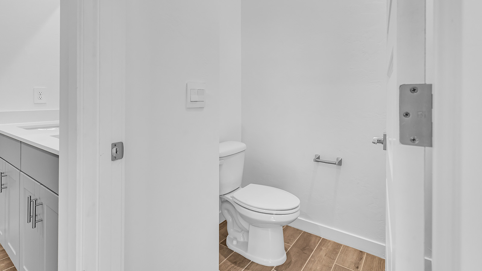 The Parker floor plan is one of the expansive new homes featured at The Oasis at Rocking K in Vail, Arizona. This vibrant community is nestled against the backdrop of the Rincon Mountains. The Parker stands out as a spacious single-story new home, offering 1,914 square feet of living space, making it the largest single-story floorplan available in this community.  The Parker is a reflection of elegance that defines The Oasis at Rocking K. The beautifully landscaped front yard, complete with an irrigation system, enhances the curb appeal, with a covered front porch.  Step into a well-planned layout that effortlessly balances functionality. The Parker features five bedrooms, including a private primary suite with a walk-in closet and en-suite bathroom. The additional bedrooms are thoughtfully situated to provide privacy and comfort, with easy access to two full bathrooms.  The heart of The Parker is the kitchen, which seamlessly connects to the dining room and great room. The kitchen is equipped with high-end finishes, including quartz countertops, shaker-style cabinets, and stainless-steel appliances. A generous pantry and plenty of cabinet space ensure that storage is never an issue.  The Parker includes a covered back patio, perfect for enjoying the tranquility of the surrounding landscape. Inside, the home features durable wood-look tile flooring in the main living areas, adding warmth and elegance to the space.  The Parker comes equipped with the Home is Connected® Smart Home package. This includes a smart thermostat, video doorbell, keyless entry, and more. Additionally, the home meets DOE Zero Energy Ready Home standards, with features like spray foam insulation and tankless water heaters, ensuring long-term savings and a reduced environmental footprint.  Living in The Oasis at Rocking K means enjoying a community rich in amenities. Whether you’re seeking a peaceful retreat or an active lifestyle, The Parker at The Oasis at Rocking K offers the perfect home base.