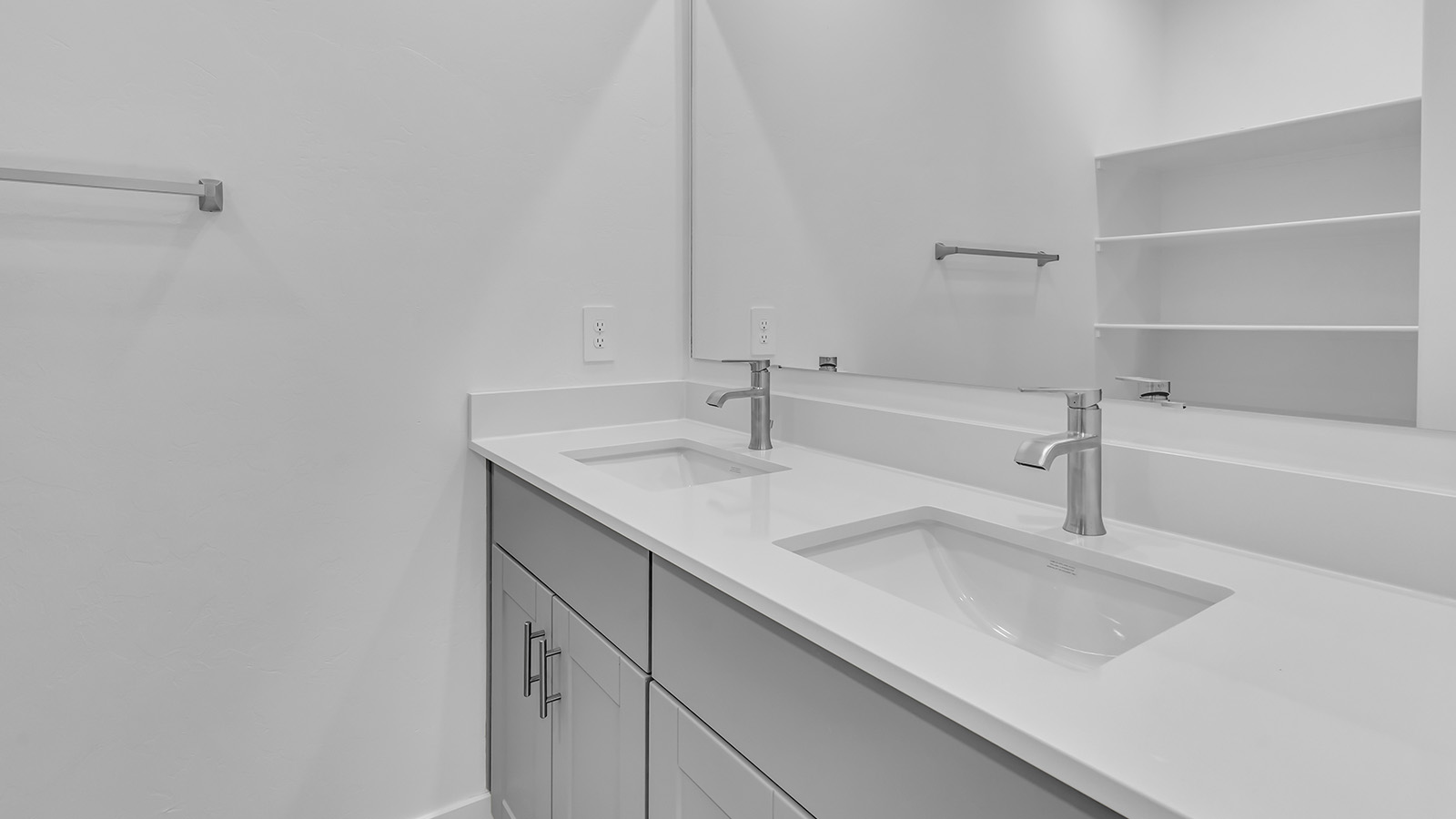 The Parker floor plan is one of the expansive new homes featured at The Oasis at Rocking K in Vail, Arizona. This vibrant community is nestled against the backdrop of the Rincon Mountains. The Parker stands out as a spacious single-story new home, offering 1,914 square feet of living space, making it the largest single-story floorplan available in this community.  The Parker is a reflection of elegance that defines The Oasis at Rocking K. The beautifully landscaped front yard, complete with an irrigation system, enhances the curb appeal, with a covered front porch.  Step into a well-planned layout that effortlessly balances functionality. The Parker features five bedrooms, including a private primary suite with a walk-in closet and en-suite bathroom. The additional bedrooms are thoughtfully situated to provide privacy and comfort, with easy access to two full bathrooms.  The heart of The Parker is the kitchen, which seamlessly connects to the dining room and great room. The kitchen is equipped with high-end finishes, including quartz countertops, shaker-style cabinets, and stainless-steel appliances. A generous pantry and plenty of cabinet space ensure that storage is never an issue.  The Parker includes a covered back patio, perfect for enjoying the tranquility of the surrounding landscape. Inside, the home features durable wood-look tile flooring in the main living areas, adding warmth and elegance to the space.  The Parker comes equipped with the Home is Connected® Smart Home package. This includes a smart thermostat, video doorbell, keyless entry, and more. Additionally, the home meets DOE Zero Energy Ready Home standards, with features like spray foam insulation and tankless water heaters, ensuring long-term savings and a reduced environmental footprint.  Living in The Oasis at Rocking K means enjoying a community rich in amenities. Whether you’re seeking a peaceful retreat or an active lifestyle, The Parker at The Oasis at Rocking K offers the perfect home base.