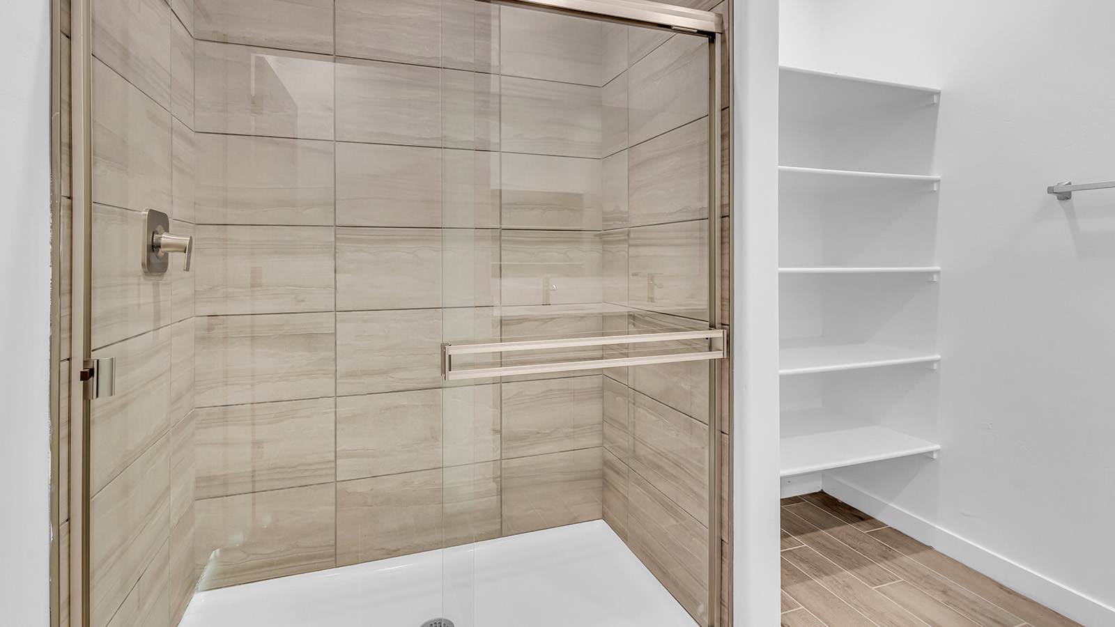 The Parker floor plan is one of the expansive new homes featured at The Oasis at Rocking K in Vail, Arizona. This vibrant community is nestled against the backdrop of the Rincon Mountains. The Parker stands out as a spacious single-story new home, offering 1,914 square feet of living space, making it the largest single-story floorplan available in this community.  The Parker is a reflection of elegance that defines The Oasis at Rocking K. The beautifully landscaped front yard, complete with an irrigation system, enhances the curb appeal, with a covered front porch.  Step into a well-planned layout that effortlessly balances functionality. The Parker features five bedrooms, including a private primary suite with a walk-in closet and en-suite bathroom. The additional bedrooms are thoughtfully situated to provide privacy and comfort, with easy access to two full bathrooms.  The heart of The Parker is the kitchen, which seamlessly connects to the dining room and great room. The kitchen is equipped with high-end finishes, including quartz countertops, shaker-style cabinets, and stainless-steel appliances. A generous pantry and plenty of cabinet space ensure that storage is never an issue.  The Parker includes a covered back patio, perfect for enjoying the tranquility of the surrounding landscape. Inside, the home features durable wood-look tile flooring in the main living areas, adding warmth and elegance to the space.  The Parker comes equipped with the Home is Connected® Smart Home package. This includes a smart thermostat, video doorbell, keyless entry, and more. Additionally, the home meets DOE Zero Energy Ready Home standards, with features like spray foam insulation and tankless water heaters, ensuring long-term savings and a reduced environmental footprint.  Living in The Oasis at Rocking K means enjoying a community rich in amenities. Whether you’re seeking a peaceful retreat or an active lifestyle, The Parker at The Oasis at Rocking K offers the perfect home base.