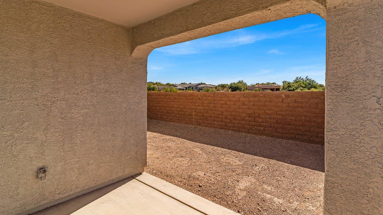 The Parker floor plan is one of the expansive new homes featured at The Oasis at Rocking K in Vail, Arizona. This vibrant community is nestled against the backdrop of the Rincon Mountains. The Parker stands out as a spacious single-story new home, offering 1,914 square feet of living space, making it the largest single-story floorplan available in this community.  The Parker is a reflection of elegance that defines The Oasis at Rocking K. The beautifully landscaped front yard, complete with an irrigation system, enhances the curb appeal, with a covered front porch.  Step into a well-planned layout that effortlessly balances functionality. The Parker features five bedrooms, including a private primary suite with a walk-in closet and en-suite bathroom. The additional bedrooms are thoughtfully situated to provide privacy and comfort, with easy access to two full bathrooms.  The heart of The Parker is the kitchen, which seamlessly connects to the dining room and great room. The kitchen is equipped with high-end finishes, including quartz countertops, shaker-style cabinets, and stainless-steel appliances. A generous pantry and plenty of cabinet space ensure that storage is never an issue.  The Parker includes a covered back patio, perfect for enjoying the tranquility of the surrounding landscape. Inside, the home features durable wood-look tile flooring in the main living areas, adding warmth and elegance to the space.  The Parker comes equipped with the Home is Connected® Smart Home package. This includes a smart thermostat, video doorbell, keyless entry, and more. Additionally, the home meets DOE Zero Energy Ready Home standards, with features like spray foam insulation and tankless water heaters, ensuring long-term savings and a reduced environmental footprint.  Living in The Oasis at Rocking K means enjoying a community rich in amenities. Whether you’re seeking a peaceful retreat or an active lifestyle, The Parker at The Oasis at Rocking K offers the perfect home base.