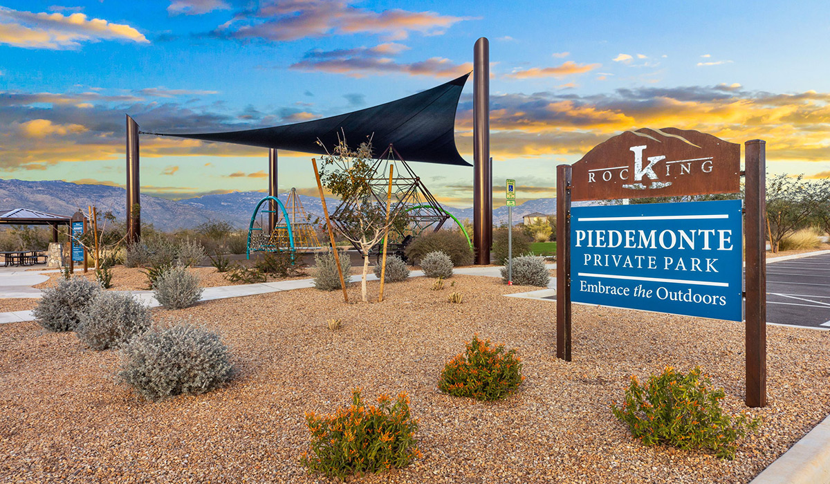 The Parker floor plan is one of the expansive new homes featured at The Oasis at Rocking K in Vail, Arizona. This vibrant community is nestled against the backdrop of the Rincon Mountains. The Parker stands out as a spacious single-story new home, offering 1,914 square feet of living space, making it the largest single-story floorplan available in this community.  The Parker is a reflection of elegance that defines The Oasis at Rocking K. The beautifully landscaped front yard, complete with an irrigation system, enhances the curb appeal, with a covered front porch.  Step into a well-planned layout that effortlessly balances functionality. The Parker features five bedrooms, including a private primary suite with a walk-in closet and en-suite bathroom. The additional bedrooms are thoughtfully situated to provide privacy and comfort, with easy access to two full bathrooms.  The heart of The Parker is the kitchen, which seamlessly connects to the dining room and great room. The kitchen is equipped with high-end finishes, including quartz countertops, shaker-style cabinets, and stainless-steel appliances. A generous pantry and plenty of cabinet space ensure that storage is never an issue.  The Parker includes a covered back patio, perfect for enjoying the tranquility of the surrounding landscape. Inside, the home features durable wood-look tile flooring in the main living areas, adding warmth and elegance to the space.  The Parker comes equipped with the Home is Connected® Smart Home package. This includes a smart thermostat, video doorbell, keyless entry, and more. Additionally, the home meets DOE Zero Energy Ready Home standards, with features like spray foam insulation and tankless water heaters, ensuring long-term savings and a reduced environmental footprint.  Living in The Oasis at Rocking K means enjoying a community rich in amenities. Whether you’re seeking a peaceful retreat or an active lifestyle, The Parker at The Oasis at Rocking K offers the perfect home base.