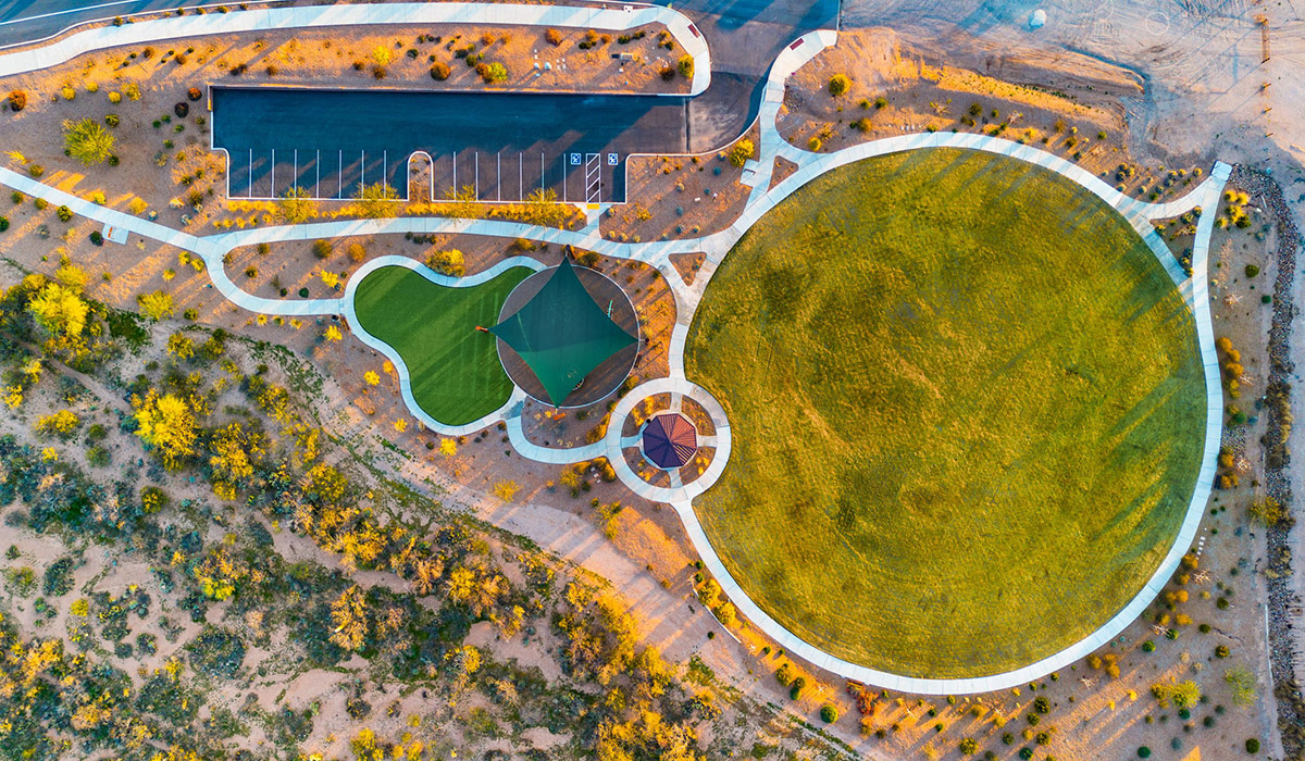 The Parker floor plan is one of the expansive new homes featured at The Oasis at Rocking K in Vail, Arizona. This vibrant community is nestled against the backdrop of the Rincon Mountains. The Parker stands out as a spacious single-story new home, offering 1,914 square feet of living space, making it the largest single-story floorplan available in this community.  The Parker is a reflection of elegance that defines The Oasis at Rocking K. The beautifully landscaped front yard, complete with an irrigation system, enhances the curb appeal, with a covered front porch.  Step into a well-planned layout that effortlessly balances functionality. The Parker features five bedrooms, including a private primary suite with a walk-in closet and en-suite bathroom. The additional bedrooms are thoughtfully situated to provide privacy and comfort, with easy access to two full bathrooms.  The heart of The Parker is the kitchen, which seamlessly connects to the dining room and great room. The kitchen is equipped with high-end finishes, including quartz countertops, shaker-style cabinets, and stainless-steel appliances. A generous pantry and plenty of cabinet space ensure that storage is never an issue.  The Parker includes a covered back patio, perfect for enjoying the tranquility of the surrounding landscape. Inside, the home features durable wood-look tile flooring in the main living areas, adding warmth and elegance to the space.  The Parker comes equipped with the Home is Connected® Smart Home package. This includes a smart thermostat, video doorbell, keyless entry, and more. Additionally, the home meets DOE Zero Energy Ready Home standards, with features like spray foam insulation and tankless water heaters, ensuring long-term savings and a reduced environmental footprint.  Living in The Oasis at Rocking K means enjoying a community rich in amenities. Whether you’re seeking a peaceful retreat or an active lifestyle, The Parker at The Oasis at Rocking K offers the perfect home base.