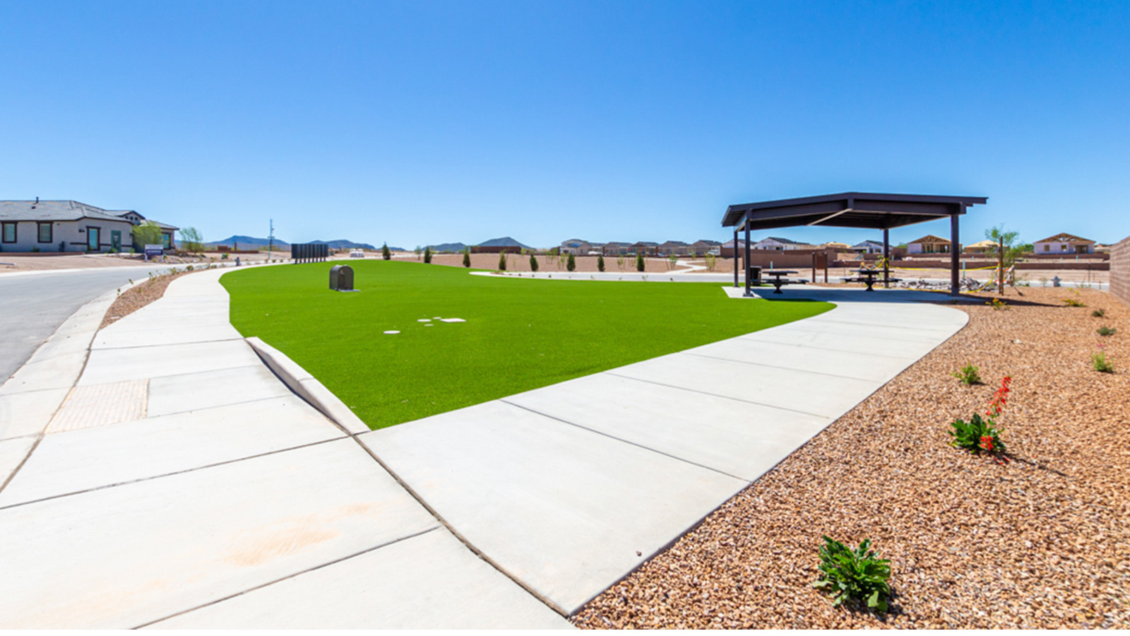 The Parker floor plan is one of the expansive new homes featured at The Oasis at Rocking K in Vail, Arizona. This vibrant community is nestled against the backdrop of the Rincon Mountains. The Parker stands out as a spacious single-story new home, offering 1,914 square feet of living space, making it the largest single-story floorplan available in this community.  The Parker is a reflection of elegance that defines The Oasis at Rocking K. The beautifully landscaped front yard, complete with an irrigation system, enhances the curb appeal, with a covered front porch.  Step into a well-planned layout that effortlessly balances functionality. The Parker features five bedrooms, including a private primary suite with a walk-in closet and en-suite bathroom. The additional bedrooms are thoughtfully situated to provide privacy and comfort, with easy access to two full bathrooms.  The heart of The Parker is the kitchen, which seamlessly connects to the dining room and great room. The kitchen is equipped with high-end finishes, including quartz countertops, shaker-style cabinets, and stainless-steel appliances. A generous pantry and plenty of cabinet space ensure that storage is never an issue.  The Parker includes a covered back patio, perfect for enjoying the tranquility of the surrounding landscape. Inside, the home features durable wood-look tile flooring in the main living areas, adding warmth and elegance to the space.  The Parker comes equipped with the Home is Connected® Smart Home package. This includes a smart thermostat, video doorbell, keyless entry, and more. Additionally, the home meets DOE Zero Energy Ready Home standards, with features like spray foam insulation and tankless water heaters, ensuring long-term savings and a reduced environmental footprint.  Living in The Oasis at Rocking K means enjoying a community rich in amenities. Whether you’re seeking a peaceful retreat or an active lifestyle, The Parker at The Oasis at Rocking K offers the perfect home base.