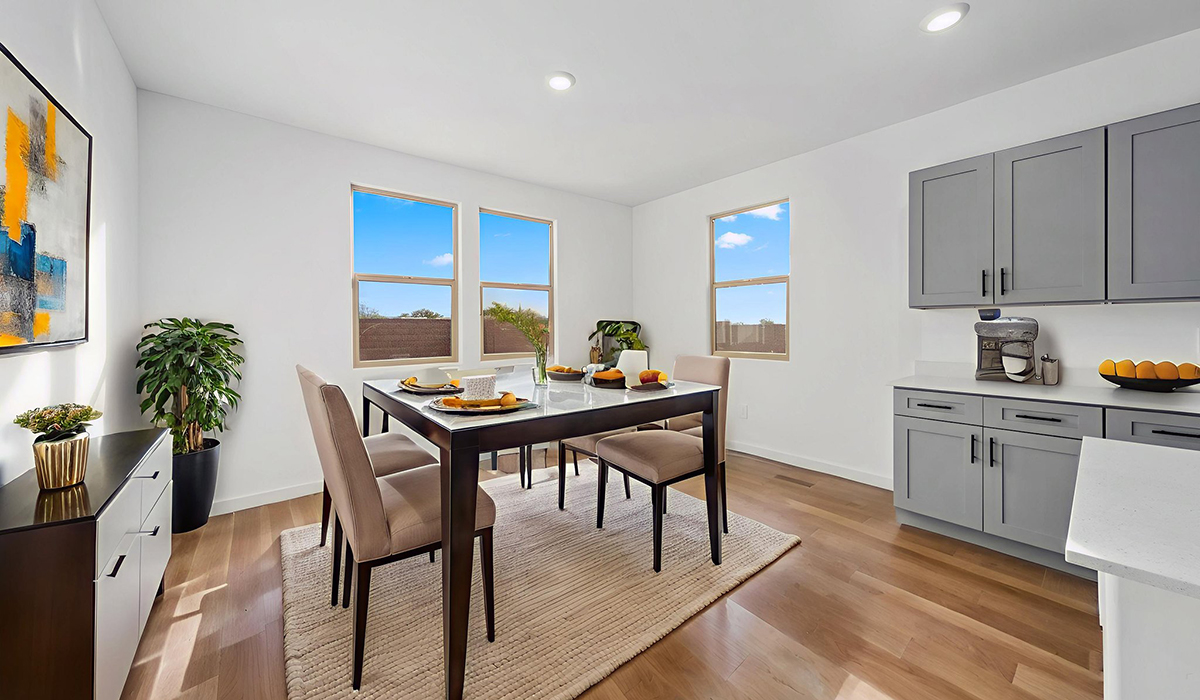 The Juniper at The Oasis at Rocking K presents an exceptional living experience that blends comfort and style within its thoughtfully crafted 2,439 square feet. This two-story, four-bedroom, two full bathroom, and one half-bathroom home offers space and room to grow. This home features a three-car tandem garage. The Juniper home is designed to cater to a variety of lifestyle needs, offering both privacy and open spaces that encourage togetherness. As you step into the welcoming entryway, you're led into a spacious great room that seamlessly connects with the dining room and kitchen, creating a perfect setting for daily living and entertaining. The kitchen is a true culinary delight, featuring elegant countertops, shaker-style cabinets, and a modern layout that includes a pantry for additional storage.  Welcome to The Juniper at Oasis at Rocking K, a premier D.R. Horton new home community nestled in the picturesque landscapes of Vail, Arizona, where new homes blend seamlessly with the breathtaking surroundings of the Rincon Mountains. Experience the perfect balance of tranquility and modern convenience in this master-planned neighborhood, designed to offer a lifestyle that caters to families, nature enthusiasts, and anyone seeking a peaceful yet connected community.  Each home in The Oasis at Rocking K is equipped with D.R. Horton’s Home is Connected® Smart Home package, which includes a smart thermostat, video doorbell, keyless entry, Wi-Fi-enabled garage door opener, and Deako light switches. Additionally, these homes meet the stringent DOE Zero Energy Ready Home standards, making them not only comfortable and modern but also exceptionally energy efficient. With features like spray foam insulation, tankless water heaters and LED lighting, these homes are designed to reduce your environmental footprint and provide long-term savings on energy costs.  Living at Rocking K means being part of a vibrant, family-oriented community with a strong sense of connection among residents. The Oasis at Rocking K offers a variety of amenities, including ramadas, picnic tables, and grassy areas perfect for gatherings. Residents also have access to the greater Rocking K master-planned neighborhood amenities, such as a splashpad, large event lawn, walking paths, multipurpose fields, basketball and pickleball courts, and an innovative playground with a zip-line and jungle gym. The new K-8 school, set to open in 2025, is just one of the many features that make Rocking K ideal for families.  Life at Rocking K is further enriched by a lively calendar of lifestyle events, thoughtfully organized by the Rocking K Homeowners Association. These events are a cornerstone of community life, fostering a strong sense of connection among residents. Whether you’re looking to enjoy a quiet evening star gazing in the park or engage in fun activities with neighbors, there’s always something happening. The quarterly lifestyle calendar is packed with regular and seasonal events, including movie nights in the park, sports and summer camps for kids, and wine tasting events for adults. Families can join hiking groups, participate in trivia nights, or enjoy the various holiday celebrations. The community comes alive during the holidays with loads of themed events, arts and crafts fairs, and car shows. Rocking K’s commitment to providing a dynamic and engaging environment ensures that there’s always an opportunity to make memories and build lasting friendships right in your neighborhood.  Residents of Rocking K benefit from easy access to I-10, making commutes to Tucson and surrounding areas a breeze. The community is close to major employers such as Davis-Monthan Air Force Base, Raytheon, and the University of Arizona, as well as top-notch healthcare facilities like TMC Rincon and Northwest Hospital East. The nearby Houghton Town Center and Houghton Rd. business corridor offer convenient shopping, dining, and services.  For outdoor enthusiasts, Rocking K is surrounded by natural beauty and recreational opportunities. Explore the hiking and biking trails at Colossal Cave Mountain Park, Saguaro National Park East, and the Arizona Trail. Enjoy golfing at Del Lago Golf Course or take a short drive to Sonoita for a day trip to Arizona’s Wine Country. Whether it’s hiking, camping, or simply taking in the stunning views, Rocking K is your gateway to the great outdoors. With 360-degree mountain views, calm and quiet evenings, and a location that’s close to everything you need, Rocking K is truly a community where you can thrive. Experience the best of Arizona living at The Oasis at Rocking K, where your new home awaits in a community that offers everything you need for a fulfilling lifestyle.  *Images shown are for reference only. They depict the Juniper model home and include virtual staging and may not represent the actual home.