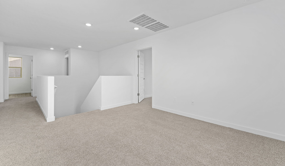 The Juniper at The Oasis at Rocking K presents an exceptional living experience that blends comfort and style within its thoughtfully crafted 2,439 square feet. This two-story, four-bedroom, two full bathroom, and one half-bathroom home offers space and room to grow. This home features a three-car tandem garage. The Juniper home is designed to cater to a variety of lifestyle needs, offering both privacy and open spaces that encourage togetherness. As you step into the welcoming entryway, you're led into a spacious great room that seamlessly connects with the dining room and kitchen, creating a perfect setting for daily living and entertaining. The kitchen is a true culinary delight, featuring elegant countertops, shaker-style cabinets, and a modern layout that includes a pantry for additional storage.  Welcome to The Juniper at Oasis at Rocking K, a premier D.R. Horton new home community nestled in the picturesque landscapes of Vail, Arizona, where new homes blend seamlessly with the breathtaking surroundings of the Rincon Mountains. Experience the perfect balance of tranquility and modern convenience in this master-planned neighborhood, designed to offer a lifestyle that caters to families, nature enthusiasts, and anyone seeking a peaceful yet connected community.  Each home in The Oasis at Rocking K is equipped with D.R. Horton’s Home is Connected® Smart Home package, which includes a smart thermostat, video doorbell, keyless entry, Wi-Fi-enabled garage door opener, and Deako light switches. Additionally, these homes meet the stringent DOE Zero Energy Ready Home standards, making them not only comfortable and modern but also exceptionally energy efficient. With features like spray foam insulation, tankless water heaters and LED lighting, these homes are designed to reduce your environmental footprint and provide long-term savings on energy costs.  Living at Rocking K means being part of a vibrant, family-oriented community with a strong sense of connection among residents. The Oasis at Rocking K offers a variety of amenities, including ramadas, picnic tables, and grassy areas perfect for gatherings. Residents also have access to the greater Rocking K master-planned neighborhood amenities, such as a splashpad, large event lawn, walking paths, multipurpose fields, basketball and pickleball courts, and an innovative playground with a zip-line and jungle gym. The new K-8 school, set to open in 2025, is just one of the many features that make Rocking K ideal for families.  Life at Rocking K is further enriched by a lively calendar of lifestyle events, thoughtfully organized by the Rocking K Homeowners Association. These events are a cornerstone of community life, fostering a strong sense of connection among residents. Whether you’re looking to enjoy a quiet evening star gazing in the park or engage in fun activities with neighbors, there’s always something happening. The quarterly lifestyle calendar is packed with regular and seasonal events, including movie nights in the park, sports and summer camps for kids, and wine tasting events for adults. Families can join hiking groups, participate in trivia nights, or enjoy the various holiday celebrations. The community comes alive during the holidays with loads of themed events, arts and crafts fairs, and car shows. Rocking K’s commitment to providing a dynamic and engaging environment ensures that there’s always an opportunity to make memories and build lasting friendships right in your neighborhood.  Residents of Rocking K benefit from easy access to I-10, making commutes to Tucson and surrounding areas a breeze. The community is close to major employers such as Davis-Monthan Air Force Base, Raytheon, and the University of Arizona, as well as top-notch healthcare facilities like TMC Rincon and Northwest Hospital East. The nearby Houghton Town Center and Houghton Rd. business corridor offer convenient shopping, dining, and services.  For outdoor enthusiasts, Rocking K is surrounded by natural beauty and recreational opportunities. Explore the hiking and biking trails at Colossal Cave Mountain Park, Saguaro National Park East, and the Arizona Trail. Enjoy golfing at Del Lago Golf Course or take a short drive to Sonoita for a day trip to Arizona’s Wine Country. Whether it’s hiking, camping, or simply taking in the stunning views, Rocking K is your gateway to the great outdoors. With 360-degree mountain views, calm and quiet evenings, and a location that’s close to everything you need, Rocking K is truly a community where you can thrive. Experience the best of Arizona living at The Oasis at Rocking K, where your new home awaits in a community that offers everything you need for a fulfilling lifestyle.  *Images shown are for reference only. They depict the Juniper model home and include virtual staging and may not represent the actual home.