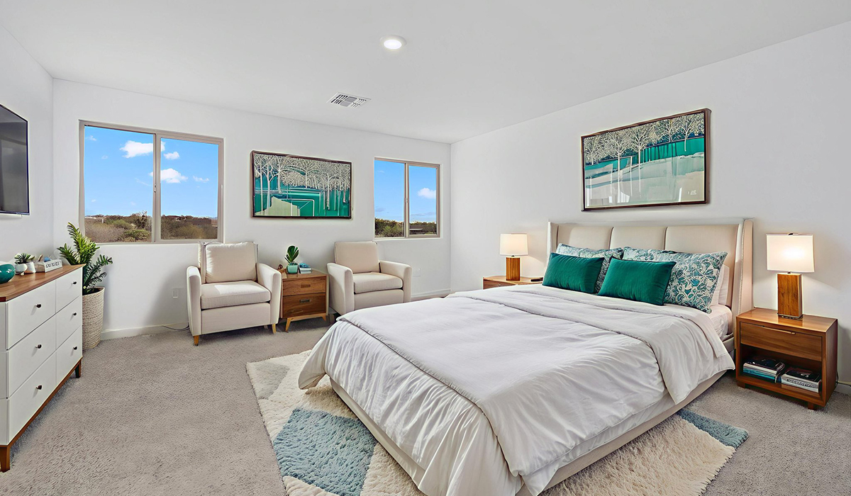 The Juniper at The Oasis at Rocking K presents an exceptional living experience that blends comfort and style within its thoughtfully crafted 2,439 square feet. This two-story, four-bedroom, two full bathroom, and one half-bathroom home offers space and room to grow. This home features a three-car tandem garage. The Juniper home is designed to cater to a variety of lifestyle needs, offering both privacy and open spaces that encourage togetherness. As you step into the welcoming entryway, you're led into a spacious great room that seamlessly connects with the dining room and kitchen, creating a perfect setting for daily living and entertaining. The kitchen is a true culinary delight, featuring elegant countertops, shaker-style cabinets, and a modern layout that includes a pantry for additional storage.  Welcome to The Juniper at Oasis at Rocking K, a premier D.R. Horton new home community nestled in the picturesque landscapes of Vail, Arizona, where new homes blend seamlessly with the breathtaking surroundings of the Rincon Mountains. Experience the perfect balance of tranquility and modern convenience in this master-planned neighborhood, designed to offer a lifestyle that caters to families, nature enthusiasts, and anyone seeking a peaceful yet connected community.  Each home in The Oasis at Rocking K is equipped with D.R. Horton’s Home is Connected® Smart Home package, which includes a smart thermostat, video doorbell, keyless entry, Wi-Fi-enabled garage door opener, and Deako light switches. Additionally, these homes meet the stringent DOE Zero Energy Ready Home standards, making them not only comfortable and modern but also exceptionally energy efficient. With features like spray foam insulation, tankless water heaters and LED lighting, these homes are designed to reduce your environmental footprint and provide long-term savings on energy costs.  Living at Rocking K means being part of a vibrant, family-oriented community with a strong sense of connection among residents. The Oasis at Rocking K offers a variety of amenities, including ramadas, picnic tables, and grassy areas perfect for gatherings. Residents also have access to the greater Rocking K master-planned neighborhood amenities, such as a splashpad, large event lawn, walking paths, multipurpose fields, basketball and pickleball courts, and an innovative playground with a zip-line and jungle gym. The new K-8 school, set to open in 2025, is just one of the many features that make Rocking K ideal for families.  Life at Rocking K is further enriched by a lively calendar of lifestyle events, thoughtfully organized by the Rocking K Homeowners Association. These events are a cornerstone of community life, fostering a strong sense of connection among residents. Whether you’re looking to enjoy a quiet evening star gazing in the park or engage in fun activities with neighbors, there’s always something happening. The quarterly lifestyle calendar is packed with regular and seasonal events, including movie nights in the park, sports and summer camps for kids, and wine tasting events for adults. Families can join hiking groups, participate in trivia nights, or enjoy the various holiday celebrations. The community comes alive during the holidays with loads of themed events, arts and crafts fairs, and car shows. Rocking K’s commitment to providing a dynamic and engaging environment ensures that there’s always an opportunity to make memories and build lasting friendships right in your neighborhood.  Residents of Rocking K benefit from easy access to I-10, making commutes to Tucson and surrounding areas a breeze. The community is close to major employers such as Davis-Monthan Air Force Base, Raytheon, and the University of Arizona, as well as top-notch healthcare facilities like TMC Rincon and Northwest Hospital East. The nearby Houghton Town Center and Houghton Rd. business corridor offer convenient shopping, dining, and services.  For outdoor enthusiasts, Rocking K is surrounded by natural beauty and recreational opportunities. Explore the hiking and biking trails at Colossal Cave Mountain Park, Saguaro National Park East, and the Arizona Trail. Enjoy golfing at Del Lago Golf Course or take a short drive to Sonoita for a day trip to Arizona’s Wine Country. Whether it’s hiking, camping, or simply taking in the stunning views, Rocking K is your gateway to the great outdoors. With 360-degree mountain views, calm and quiet evenings, and a location that’s close to everything you need, Rocking K is truly a community where you can thrive. Experience the best of Arizona living at The Oasis at Rocking K, where your new home awaits in a community that offers everything you need for a fulfilling lifestyle.  *Images shown are for reference only. They depict the Juniper model home and include virtual staging and may not represent the actual home.