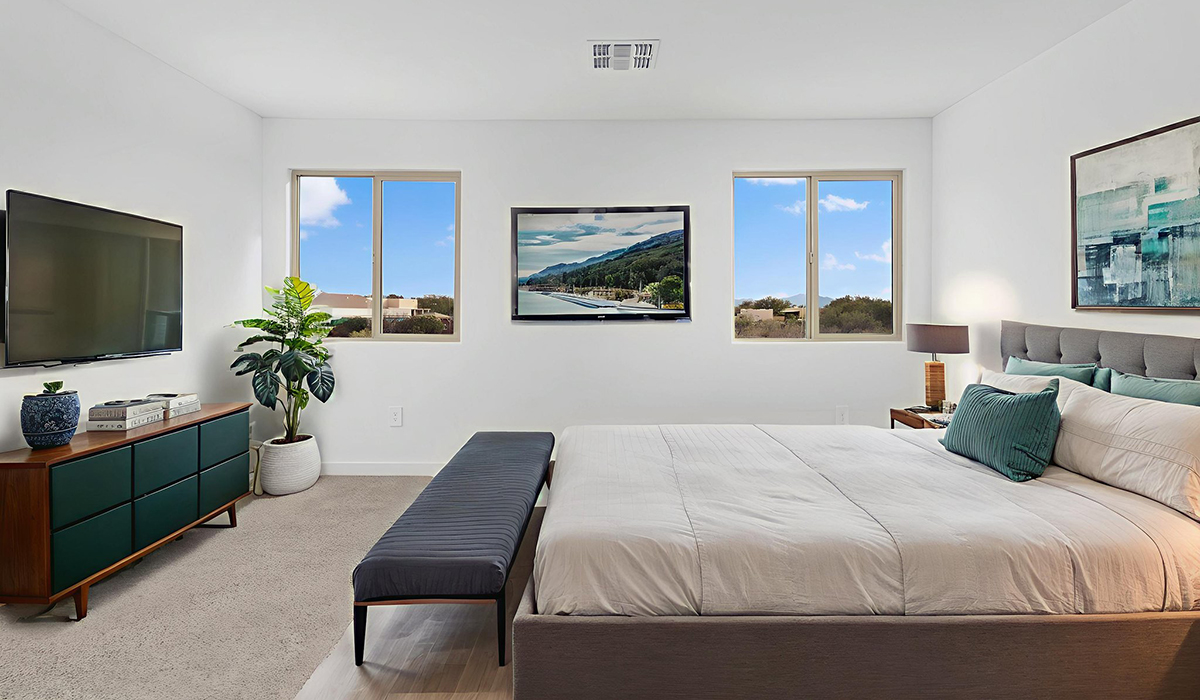 The Juniper at The Oasis at Rocking K presents an exceptional living experience that blends comfort and style within its thoughtfully crafted 2,439 square feet. This two-story, four-bedroom, two full bathroom, and one half-bathroom home offers space and room to grow. This home features a three-car tandem garage. The Juniper home is designed to cater to a variety of lifestyle needs, offering both privacy and open spaces that encourage togetherness. As you step into the welcoming entryway, you're led into a spacious great room that seamlessly connects with the dining room and kitchen, creating a perfect setting for daily living and entertaining. The kitchen is a true culinary delight, featuring elegant countertops, shaker-style cabinets, and a modern layout that includes a pantry for additional storage.  Welcome to The Juniper at Oasis at Rocking K, a premier D.R. Horton new home community nestled in the picturesque landscapes of Vail, Arizona, where new homes blend seamlessly with the breathtaking surroundings of the Rincon Mountains. Experience the perfect balance of tranquility and modern convenience in this master-planned neighborhood, designed to offer a lifestyle that caters to families, nature enthusiasts, and anyone seeking a peaceful yet connected community.  Each home in The Oasis at Rocking K is equipped with D.R. Horton’s Home is Connected® Smart Home package, which includes a smart thermostat, video doorbell, keyless entry, Wi-Fi-enabled garage door opener, and Deako light switches. Additionally, these homes meet the stringent DOE Zero Energy Ready Home standards, making them not only comfortable and modern but also exceptionally energy efficient. With features like spray foam insulation, tankless water heaters and LED lighting, these homes are designed to reduce your environmental footprint and provide long-term savings on energy costs.  Living at Rocking K means being part of a vibrant, family-oriented community with a strong sense of connection among residents. The Oasis at Rocking K offers a variety of amenities, including ramadas, picnic tables, and grassy areas perfect for gatherings. Residents also have access to the greater Rocking K master-planned neighborhood amenities, such as a splashpad, large event lawn, walking paths, multipurpose fields, basketball and pickleball courts, and an innovative playground with a zip-line and jungle gym. The new K-8 school, set to open in 2025, is just one of the many features that make Rocking K ideal for families.  Life at Rocking K is further enriched by a lively calendar of lifestyle events, thoughtfully organized by the Rocking K Homeowners Association. These events are a cornerstone of community life, fostering a strong sense of connection among residents. Whether you’re looking to enjoy a quiet evening star gazing in the park or engage in fun activities with neighbors, there’s always something happening. The quarterly lifestyle calendar is packed with regular and seasonal events, including movie nights in the park, sports and summer camps for kids, and wine tasting events for adults. Families can join hiking groups, participate in trivia nights, or enjoy the various holiday celebrations. The community comes alive during the holidays with loads of themed events, arts and crafts fairs, and car shows. Rocking K’s commitment to providing a dynamic and engaging environment ensures that there’s always an opportunity to make memories and build lasting friendships right in your neighborhood.  Residents of Rocking K benefit from easy access to I-10, making commutes to Tucson and surrounding areas a breeze. The community is close to major employers such as Davis-Monthan Air Force Base, Raytheon, and the University of Arizona, as well as top-notch healthcare facilities like TMC Rincon and Northwest Hospital East. The nearby Houghton Town Center and Houghton Rd. business corridor offer convenient shopping, dining, and services.  For outdoor enthusiasts, Rocking K is surrounded by natural beauty and recreational opportunities. Explore the hiking and biking trails at Colossal Cave Mountain Park, Saguaro National Park East, and the Arizona Trail. Enjoy golfing at Del Lago Golf Course or take a short drive to Sonoita for a day trip to Arizona’s Wine Country. Whether it’s hiking, camping, or simply taking in the stunning views, Rocking K is your gateway to the great outdoors. With 360-degree mountain views, calm and quiet evenings, and a location that’s close to everything you need, Rocking K is truly a community where you can thrive. Experience the best of Arizona living at The Oasis at Rocking K, where your new home awaits in a community that offers everything you need for a fulfilling lifestyle.  *Images shown are for reference only. They depict the Juniper model home and include virtual staging and may not represent the actual home.