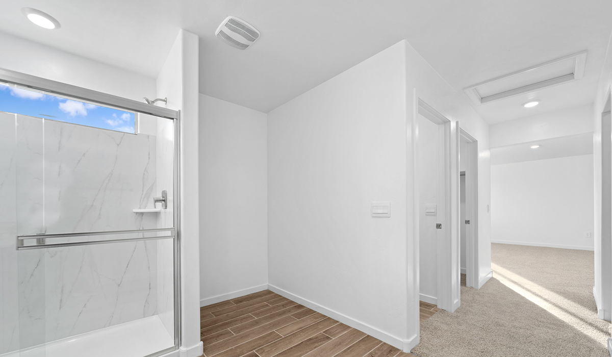 The Juniper at The Oasis at Rocking K presents an exceptional living experience that blends comfort and style within its thoughtfully crafted 2,439 square feet. This two-story, four-bedroom, two full bathroom, and one half-bathroom home offers space and room to grow. This home features a three-car tandem garage. The Juniper home is designed to cater to a variety of lifestyle needs, offering both privacy and open spaces that encourage togetherness. As you step into the welcoming entryway, you're led into a spacious great room that seamlessly connects with the dining room and kitchen, creating a perfect setting for daily living and entertaining. The kitchen is a true culinary delight, featuring elegant countertops, shaker-style cabinets, and a modern layout that includes a pantry for additional storage.  Welcome to The Juniper at Oasis at Rocking K, a premier D.R. Horton new home community nestled in the picturesque landscapes of Vail, Arizona, where new homes blend seamlessly with the breathtaking surroundings of the Rincon Mountains. Experience the perfect balance of tranquility and modern convenience in this master-planned neighborhood, designed to offer a lifestyle that caters to families, nature enthusiasts, and anyone seeking a peaceful yet connected community.  Each home in The Oasis at Rocking K is equipped with D.R. Horton’s Home is Connected® Smart Home package, which includes a smart thermostat, video doorbell, keyless entry, Wi-Fi-enabled garage door opener, and Deako light switches. Additionally, these homes meet the stringent DOE Zero Energy Ready Home standards, making them not only comfortable and modern but also exceptionally energy efficient. With features like spray foam insulation, tankless water heaters and LED lighting, these homes are designed to reduce your environmental footprint and provide long-term savings on energy costs.  Living at Rocking K means being part of a vibrant, family-oriented community with a strong sense of connection among residents. The Oasis at Rocking K offers a variety of amenities, including ramadas, picnic tables, and grassy areas perfect for gatherings. Residents also have access to the greater Rocking K master-planned neighborhood amenities, such as a splashpad, large event lawn, walking paths, multipurpose fields, basketball and pickleball courts, and an innovative playground with a zip-line and jungle gym. The new K-8 school, set to open in 2025, is just one of the many features that make Rocking K ideal for families.  Life at Rocking K is further enriched by a lively calendar of lifestyle events, thoughtfully organized by the Rocking K Homeowners Association. These events are a cornerstone of community life, fostering a strong sense of connection among residents. Whether you’re looking to enjoy a quiet evening star gazing in the park or engage in fun activities with neighbors, there’s always something happening. The quarterly lifestyle calendar is packed with regular and seasonal events, including movie nights in the park, sports and summer camps for kids, and wine tasting events for adults. Families can join hiking groups, participate in trivia nights, or enjoy the various holiday celebrations. The community comes alive during the holidays with loads of themed events, arts and crafts fairs, and car shows. Rocking K’s commitment to providing a dynamic and engaging environment ensures that there’s always an opportunity to make memories and build lasting friendships right in your neighborhood.  Residents of Rocking K benefit from easy access to I-10, making commutes to Tucson and surrounding areas a breeze. The community is close to major employers such as Davis-Monthan Air Force Base, Raytheon, and the University of Arizona, as well as top-notch healthcare facilities like TMC Rincon and Northwest Hospital East. The nearby Houghton Town Center and Houghton Rd. business corridor offer convenient shopping, dining, and services.  For outdoor enthusiasts, Rocking K is surrounded by natural beauty and recreational opportunities. Explore the hiking and biking trails at Colossal Cave Mountain Park, Saguaro National Park East, and the Arizona Trail. Enjoy golfing at Del Lago Golf Course or take a short drive to Sonoita for a day trip to Arizona’s Wine Country. Whether it’s hiking, camping, or simply taking in the stunning views, Rocking K is your gateway to the great outdoors. With 360-degree mountain views, calm and quiet evenings, and a location that’s close to everything you need, Rocking K is truly a community where you can thrive. Experience the best of Arizona living at The Oasis at Rocking K, where your new home awaits in a community that offers everything you need for a fulfilling lifestyle.  *Images shown are for reference only. They depict the Juniper model home and include virtual staging and may not represent the actual home.