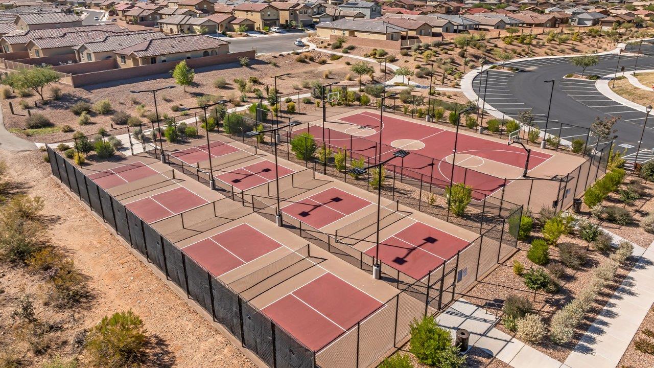 The Juniper at The Oasis at Rocking K presents an exceptional living experience that blends comfort and style within its thoughtfully crafted 2,439 square feet. This two-story, four-bedroom, two full bathroom, and one half-bathroom home offers space and room to grow. This home features a three-car tandem garage. The Juniper home is designed to cater to a variety of lifestyle needs, offering both privacy and open spaces that encourage togetherness. As you step into the welcoming entryway, you're led into a spacious great room that seamlessly connects with the dining room and kitchen, creating a perfect setting for daily living and entertaining. The kitchen is a true culinary delight, featuring elegant countertops, shaker-style cabinets, and a modern layout that includes a pantry for additional storage.  Welcome to The Juniper at Oasis at Rocking K, a premier D.R. Horton new home community nestled in the picturesque landscapes of Vail, Arizona, where new homes blend seamlessly with the breathtaking surroundings of the Rincon Mountains. Experience the perfect balance of tranquility and modern convenience in this master-planned neighborhood, designed to offer a lifestyle that caters to families, nature enthusiasts, and anyone seeking a peaceful yet connected community.  Each home in The Oasis at Rocking K is equipped with D.R. Horton’s Home is Connected® Smart Home package, which includes a smart thermostat, video doorbell, keyless entry, Wi-Fi-enabled garage door opener, and Deako light switches. Additionally, these homes meet the stringent DOE Zero Energy Ready Home standards, making them not only comfortable and modern but also exceptionally energy efficient. With features like spray foam insulation, tankless water heaters and LED lighting, these homes are designed to reduce your environmental footprint and provide long-term savings on energy costs.  Living at Rocking K means being part of a vibrant, family-oriented community with a strong sense of connection among residents. The Oasis at Rocking K offers a variety of amenities, including ramadas, picnic tables, and grassy areas perfect for gatherings. Residents also have access to the greater Rocking K master-planned neighborhood amenities, such as a splashpad, large event lawn, walking paths, multipurpose fields, basketball and pickleball courts, and an innovative playground with a zip-line and jungle gym. The new K-8 school, set to open in 2025, is just one of the many features that make Rocking K ideal for families.  Life at Rocking K is further enriched by a lively calendar of lifestyle events, thoughtfully organized by the Rocking K Homeowners Association. These events are a cornerstone of community life, fostering a strong sense of connection among residents. Whether you’re looking to enjoy a quiet evening star gazing in the park or engage in fun activities with neighbors, there’s always something happening. The quarterly lifestyle calendar is packed with regular and seasonal events, including movie nights in the park, sports and summer camps for kids, and wine tasting events for adults. Families can join hiking groups, participate in trivia nights, or enjoy the various holiday celebrations. The community comes alive during the holidays with loads of themed events, arts and crafts fairs, and car shows. Rocking K’s commitment to providing a dynamic and engaging environment ensures that there’s always an opportunity to make memories and build lasting friendships right in your neighborhood.  Residents of Rocking K benefit from easy access to I-10, making commutes to Tucson and surrounding areas a breeze. The community is close to major employers such as Davis-Monthan Air Force Base, Raytheon, and the University of Arizona, as well as top-notch healthcare facilities like TMC Rincon and Northwest Hospital East. The nearby Houghton Town Center and Houghton Rd. business corridor offer convenient shopping, dining, and services.  For outdoor enthusiasts, Rocking K is surrounded by natural beauty and recreational opportunities. Explore the hiking and biking trails at Colossal Cave Mountain Park, Saguaro National Park East, and the Arizona Trail. Enjoy golfing at Del Lago Golf Course or take a short drive to Sonoita for a day trip to Arizona’s Wine Country. Whether it’s hiking, camping, or simply taking in the stunning views, Rocking K is your gateway to the great outdoors. With 360-degree mountain views, calm and quiet evenings, and a location that’s close to everything you need, Rocking K is truly a community where you can thrive. Experience the best of Arizona living at The Oasis at Rocking K, where your new home awaits in a community that offers everything you need for a fulfilling lifestyle.