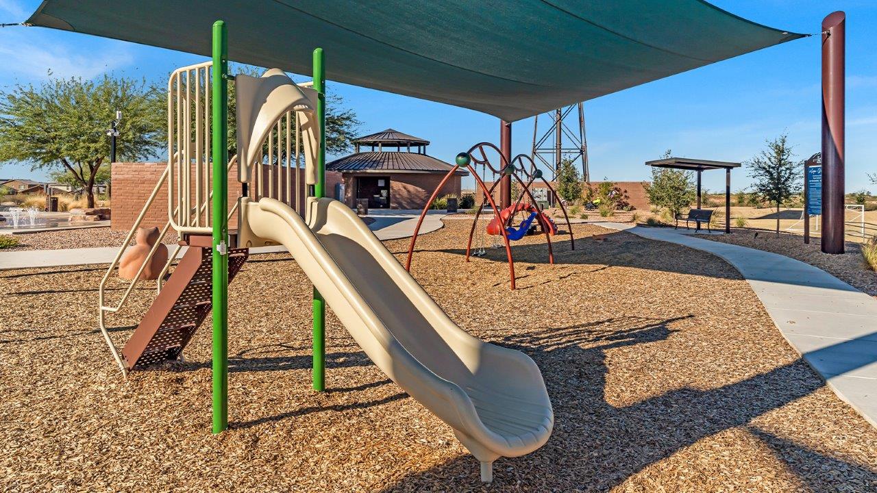 The Juniper at The Oasis at Rocking K presents an exceptional living experience that blends comfort and style within its thoughtfully crafted 2,439 square feet. This two-story, four-bedroom, two full bathroom, and one half-bathroom home offers space and room to grow. This home features a three-car tandem garage. The Juniper home is designed to cater to a variety of lifestyle needs, offering both privacy and open spaces that encourage togetherness. As you step into the welcoming entryway, you're led into a spacious great room that seamlessly connects with the dining room and kitchen, creating a perfect setting for daily living and entertaining. The kitchen is a true culinary delight, featuring elegant countertops, shaker-style cabinets, and a modern layout that includes a pantry for additional storage.  Welcome to The Juniper at Oasis at Rocking K, a premier D.R. Horton new home community nestled in the picturesque landscapes of Vail, Arizona, where new homes blend seamlessly with the breathtaking surroundings of the Rincon Mountains. Experience the perfect balance of tranquility and modern convenience in this master-planned neighborhood, designed to offer a lifestyle that caters to families, nature enthusiasts, and anyone seeking a peaceful yet connected community.  Each home in The Oasis at Rocking K is equipped with D.R. Horton’s Home is Connected® Smart Home package, which includes a smart thermostat, video doorbell, keyless entry, Wi-Fi-enabled garage door opener, and Deako light switches. Additionally, these homes meet the stringent DOE Zero Energy Ready Home standards, making them not only comfortable and modern but also exceptionally energy efficient. With features like spray foam insulation, tankless water heaters and LED lighting, these homes are designed to reduce your environmental footprint and provide long-term savings on energy costs.  Living at Rocking K means being part of a vibrant, family-oriented community with a strong sense of connection among residents. The Oasis at Rocking K offers a variety of amenities, including ramadas, picnic tables, and grassy areas perfect for gatherings. Residents also have access to the greater Rocking K master-planned neighborhood amenities, such as a splashpad, large event lawn, walking paths, multipurpose fields, basketball and pickleball courts, and an innovative playground with a zip-line and jungle gym. The new K-8 school, set to open in 2025, is just one of the many features that make Rocking K ideal for families.  Life at Rocking K is further enriched by a lively calendar of lifestyle events, thoughtfully organized by the Rocking K Homeowners Association. These events are a cornerstone of community life, fostering a strong sense of connection among residents. Whether you’re looking to enjoy a quiet evening star gazing in the park or engage in fun activities with neighbors, there’s always something happening. The quarterly lifestyle calendar is packed with regular and seasonal events, including movie nights in the park, sports and summer camps for kids, and wine tasting events for adults. Families can join hiking groups, participate in trivia nights, or enjoy the various holiday celebrations. The community comes alive during the holidays with loads of themed events, arts and crafts fairs, and car shows. Rocking K’s commitment to providing a dynamic and engaging environment ensures that there’s always an opportunity to make memories and build lasting friendships right in your neighborhood.  Residents of Rocking K benefit from easy access to I-10, making commutes to Tucson and surrounding areas a breeze. The community is close to major employers such as Davis-Monthan Air Force Base, Raytheon, and the University of Arizona, as well as top-notch healthcare facilities like TMC Rincon and Northwest Hospital East. The nearby Houghton Town Center and Houghton Rd. business corridor offer convenient shopping, dining, and services.  For outdoor enthusiasts, Rocking K is surrounded by natural beauty and recreational opportunities. Explore the hiking and biking trails at Colossal Cave Mountain Park, Saguaro National Park East, and the Arizona Trail. Enjoy golfing at Del Lago Golf Course or take a short drive to Sonoita for a day trip to Arizona’s Wine Country. Whether it’s hiking, camping, or simply taking in the stunning views, Rocking K is your gateway to the great outdoors. With 360-degree mountain views, calm and quiet evenings, and a location that’s close to everything you need, Rocking K is truly a community where you can thrive. Experience the best of Arizona living at The Oasis at Rocking K, where your new home awaits in a community that offers everything you need for a fulfilling lifestyle.