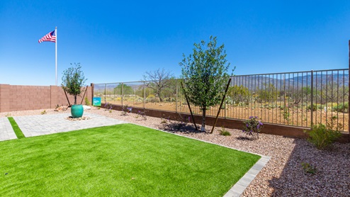 Welcome to The Oasis at Rocking K, a premier D.R. Horton new home community nestled in the picturesque landscapes of Vail, Arizona, where new homes blend seamlessly with the breathtaking surroundings of the Rincon Mountains. Experience the perfect balance of tranquility and modern convenience in this master-planned neighborhood, designed to offer a lifestyle that caters to families, nature enthusiasts, and anyone seeking a peaceful yet connected community. The Oasis at Rocking K features five beautifully designed one-story floor plans ranging from 1,400 to 1,900 square feet, each crafted with the high-quality features and finishes D.R. Horton is known for. Homes in Rocking K feature a Spanish lace stucco exterior, tile roofs, and meticulously landscaped front yards with auto drip irrigation. Inside, you’ll find luxurious quartz countertops in the kitchens and bathrooms, 42” shaker-style cabinets with modern cabinet pulls, and wood-look tile flooring throughout the main living areas. Homes also include covered front porches and back patios, perfect for enjoying Arizona’s stunning sunsets and clear night skies. Each home in The Oasis at Rocking K is equipped with D.R. Horton’s Home is Connected® Smart Home package, which includes a smart thermostat, video doorbell, keyless entry, Wi-Fi-enabled garage door opener, and Deako light switches. Additionally, these homes meet the stringent DOE Zero Energy Ready Home standards, making them not only comfortable and modern but also exceptionally energy-efficient. With features like spray foam insulation, tankless water heaters and LED lighting, these homes are designed to reduce your environmental footprint and provide long-term savings on energy costs. Living at Rocking K means being part of a vibrant, family-oriented community with a strong sense of connection among residents. The Oasis at Rocking K offers a variety of amenities, including ramadas, picnic tables, and grassy areas perfect for gatherings. Residents also have access to the greater Rocking K master-planned neighborhood amenities, such as a splashpad, large event lawn, walking paths, multipurpose fields, basketball and pickleball courts, and an innovative playground with a zip-line and jungle gym. The new K-8 school, set to open in 2025, is just one of the many features that make Rocking K ideal for families. Life at Rocking K is further enriched by a lively calendar of lifestyle events, thoughtfully organized by the Rocking K Homeowners Association. These events are a cornerstone of community life, fostering a strong sense of connection among residents. Whether you’re looking to enjoy a quiet evening star gazing in the park or engage in fun activities with neighbors, there’s always something happening. The quarterly lifestyle calendar is packed with regular and seasonal events, including movie nights in the park, sports and summer camps for kids, and wine tasting events for adults. Families can join hiking groups, participate in trivia nights, or enjoy the various holiday celebrations. The community comes alive during the holidays with loads of themed events, arts and crafts fairs, and car shows. Rocking K’s commitment to providing a dynamic and engaging environment ensures that there’s always an opportunity to make memories and build lasting friendships right in your neighborhood. Residents of Rocking K benefit from easy access to I-10, making commutes to Tucson and surrounding areas a breeze. The community is close to major employers such as Davis-Monthan Air Force Base, Raytheon, and the University of Arizona, as well as top-notch healthcare facilities like TMC Rincon and Northwest Hospital East. The nearby Houghton Town Center and Houghton Rd. business corridor offer convenient shopping, dining, and services. For outdoor enthusiasts, Rocking K is surrounded by natural beauty and recreational opportunities. Explore the hiking and biking trails at Colossal Cave Mountain Park, Saguaro National Park East, and the Arizona Trail. Enjoy golfing at Del Lago Golf Course, or take a short drive to Sonoita for a day trip to Arizona’s Wine Country. Whether it’s hiking, camping, or simply taking in the stunning views, Rocking K is your gateway to the great outdoors. With 360-degree mountain views, calm and quiet evenings, and a location that’s close to everything you need, Rocking K is truly a community where you can thrive. Experience the best of Arizona living at The Oasis at Rocking K, where your new home awaits in a community that offers everything you need for a fulfilling lifestyle.