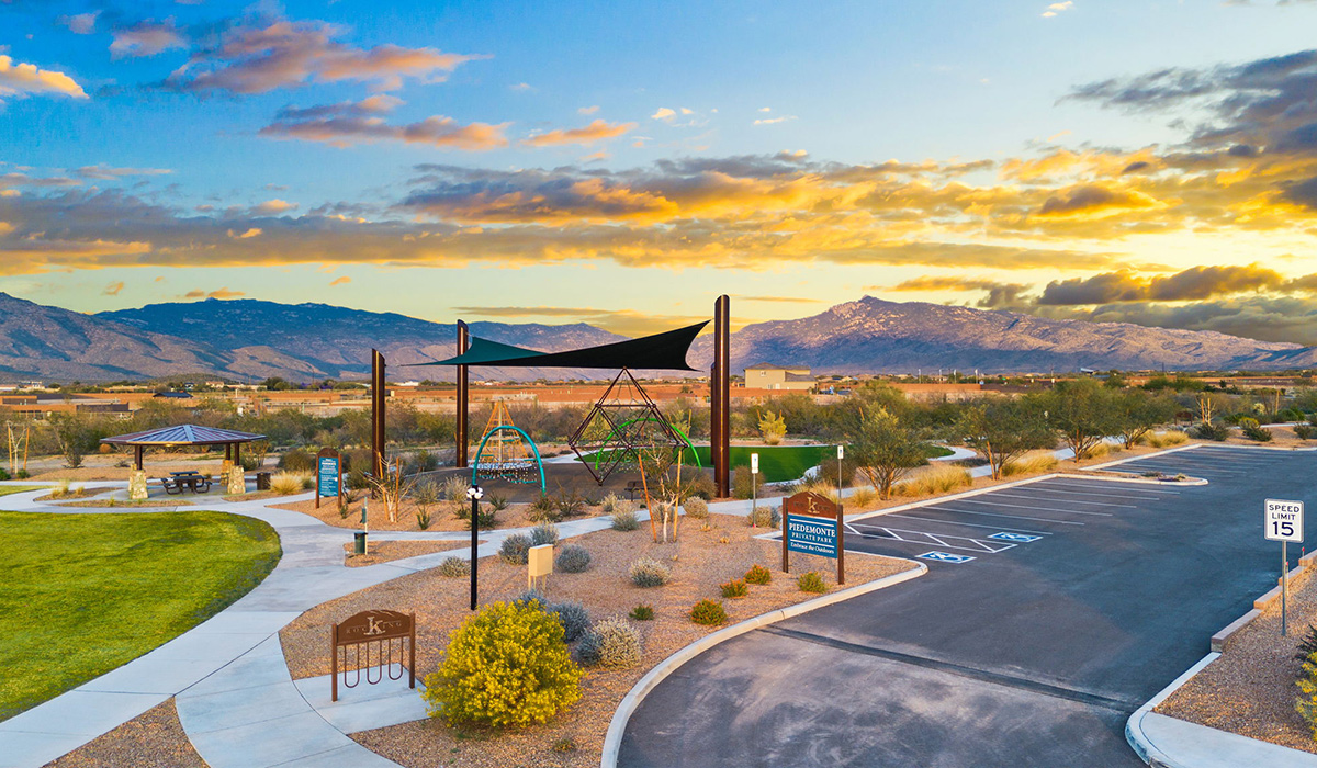 Welcome to The Oasis at Rocking K, a premier D.R. Horton new home community nestled in the picturesque landscapes of Vail, Arizona, where new homes blend seamlessly with the breathtaking surroundings of the Rincon Mountains. Experience the perfect balance of tranquility and modern convenience in this master-planned neighborhood, designed to offer a lifestyle that caters to families, nature enthusiasts, and anyone seeking a peaceful yet connected community.  The Oasis at Rocking K features five beautifully designed one-story floor plans ranging from 1,400 to 1,900 square feet, each crafted with the high-quality features and finishes D.R. Horton is known for. Homes in Rocking K feature a Spanish lace stucco exterior, tile roofs, and meticulously landscaped front yards with auto drip irrigation. Inside, you’ll find luxurious quartz countertops in the kitchens and bathrooms, 42” shaker-style cabinets with modern cabinet pulls, and wood-look tile flooring throughout the main living areas. Homes also include covered front porches and back patios, perfect for enjoying Arizona’s stunning sunsets and clear night skies.  Each home in The Oasis at Rocking K is equipped with D.R. Horton’s Home is Connected® Smart Home package, which includes a smart thermostat, video doorbell, keyless entry, Wi-Fi-enabled garage door opener, and Deako light switches. Additionally, these homes meet the stringent DOE Zero Energy Ready Home standards, making them not only comfortable and modern but also exceptionally energy-efficient. With features like spray foam insulation, tankless water heaters and LED lighting, these homes are designed to reduce your environmental footprint and provide long-term savings on energy costs.  Living at Rocking K means being part of a vibrant, family-oriented community with a strong sense of connection among residents. The Oasis at Rocking K offers a variety of amenities, including ramadas, picnic tables, and grassy areas perfect for gatherings. Residents also have access to the greater Rocking K master-planned neighborhood amenities, such as a splashpad, large event lawn, walking paths, multipurpose fields, basketball and pickleball courts, and an innovative playground with a zip-line and jungle gym. The new K-8 school, set to open in 2025, is just one of the many features that make Rocking K ideal for families.  Life at Rocking K is further enriched by a lively calendar of lifestyle events, thoughtfully organized by the Rocking K Homeowners Association. These events are a cornerstone of community life, fostering a strong sense of connection among residents. Whether you’re looking to enjoy a quiet evening star gazing in the park or engage in fun activities with neighbors, there’s always something happening. The quarterly lifestyle calendar is packed with regular and seasonal events, including movie nights in the park, sports and summer camps for kids, and wine tasting events for adults. Families can join hiking groups, participate in trivia nights, or enjoy the various holiday celebrations. The community comes alive during the holidays with loads of themed events, arts and crafts fairs, and car shows. Rocking K’s commitment to providing a dynamic and engaging environment ensures that there’s always an opportunity to make memories and build lasting friendships right in your neighborhood.   Residents of Rocking K benefit from easy access to I-10, making commutes to Tucson and surrounding areas a breeze. The community is close to major employers such as Davis-Monthan Air Force Base, Raytheon, and the University of Arizona, as well as top-notch healthcare facilities like TMC Rincon and Northwest Hospital East. The nearby Houghton Town Center and Houghton Rd. business corridor offer convenient shopping, dining, and services.  For outdoor enthusiasts, Rocking K is surrounded by natural beauty and recreational opportunities. Explore the hiking and biking trails at Colossal Cave Mountain Park, Saguaro National Park East, and the Arizona Trail. Enjoy golfing at Del Lago Golf Course, or take a short drive to Sonoita for a day trip to Arizona’s Wine Country. Whether it’s hiking, camping, or simply taking in the stunning views, Rocking K is your gateway to the great outdoors.  With 360-degree mountain views, calm and quiet evenings, and a location that’s close to everything you need, Rocking K is truly a community where you can thrive. Experience the best of Arizona living at The Oasis at Rocking K, where your new home awaits in a community that offers everything you need for a fulfilling lifestyle.