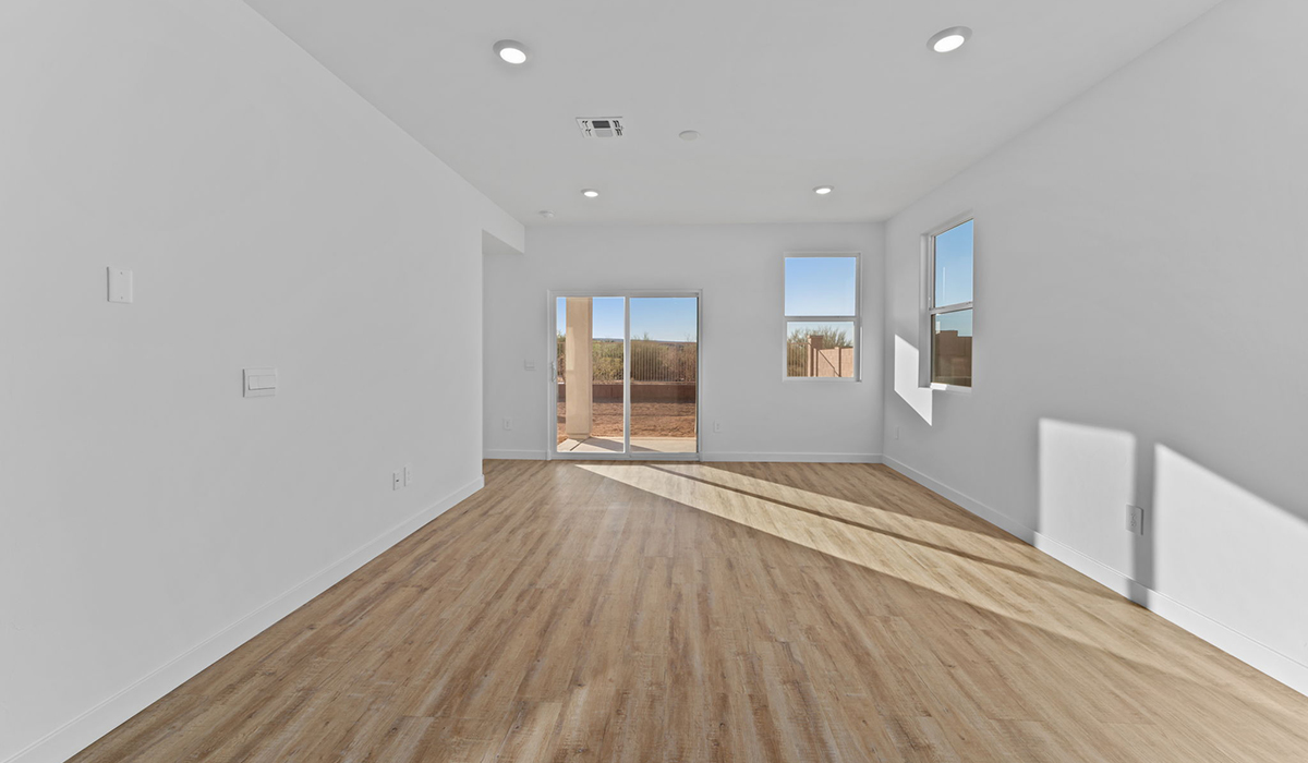 Welcome to The Aloe, a thoughtfully designed new floor plan available at The Oasis at Rocking K by D.R. Horton in Vail, Arizona. Offering 1,310 square feet of efficient and comfortable living space, The Aloe is ideal for those seeking a home that blends functionality, modern style, and everyday ease.  Upon entry, you’re welcomed into an open-concept layout that maximizes every square foot. The large great room serves as the heart of the home and flows seamlessly into the dining area and kitchen, perfect for both relaxing and entertaining. The kitchen offers a clean and modern aesthetic with ample storage and workspace.  The Aloe features three well-proportioned bedrooms designed for comfort and flexibility. The private primary suite is tucked away at the rear of the home and includes a walk-in closet and en-suite bathroom. Two additional bedrooms are located near the front of the home.  Designed with convenience in mind, the home includes a utility room near the kitchen, offering easy access to laundry and additional storage.  Step outside to a spacious backyard, where you can unwind and enjoy Vail’s beautiful weather year-round. Whether you’re sipping your morning coffee or hosting a weekend barbecue, this outdoor space serene surroundings of Rocking K.  Additionally, The Aloe is equipped with D.R. Horton’s Home is Connected Smart Home package, which includes a smart thermostat, video doorbell, keyless entry, and Wi-Fi® enabled garage door opener!  Living in Rocking K offers a variety of amenities, including playgrounds with jungle gyms, parks, ramadas, and walking and biking trails that encourage a healthy, active lifestyle. Designed with energy efficiency in mind, The Aloe at The Oasis at Rocking K is an Energy Ready Home, helping to lower utility costs, offering you long-term savings, and a sustainable living environment.  *Images shown are for reference only. They depict The Aloe spec home and may not represent the actual home.