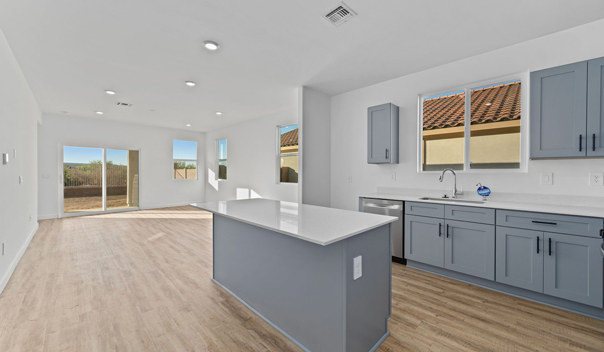 Welcome to The Aloe, a thoughtfully designed new floor plan available at The Oasis at Rocking K by D.R. Horton in Vail, Arizona. Offering 1,310 square feet of efficient and comfortable living space, The Aloe is ideal for those seeking a home that blends functionality, modern style, and everyday ease.  Upon entry, you’re welcomed into an open-concept layout that maximizes every square foot. The large great room serves as the heart of the home and flows seamlessly into the dining area and kitchen, perfect for both relaxing and entertaining. The kitchen offers a clean and modern aesthetic with ample storage and workspace.  The Aloe features three well-proportioned bedrooms designed for comfort and flexibility. The private primary suite is tucked away at the rear of the home and includes a walk-in closet and en-suite bathroom. Two additional bedrooms are located near the front of the home.  Designed with convenience in mind, the home includes a utility room near the kitchen, offering easy access to laundry and additional storage.  Step outside to a spacious backyard, where you can unwind and enjoy Vail’s beautiful weather year-round. Whether you’re sipping your morning coffee or hosting a weekend barbecue, this outdoor space serene surroundings of Rocking K.  Additionally, The Aloe is equipped with D.R. Horton’s Home is Connected Smart Home package, which includes a smart thermostat, video doorbell, keyless entry, and Wi-Fi® enabled garage door opener!  Living in Rocking K offers a variety of amenities, including playgrounds with jungle gyms, parks, ramadas, and walking and biking trails that encourage a healthy, active lifestyle. Designed with energy efficiency in mind, The Aloe at The Oasis at Rocking K is an Energy Ready Home, helping to lower utility costs, offering you long-term savings, and a sustainable living environment.  *Images shown are for reference only. They depict The Aloe spec home and may not represent the actual home.