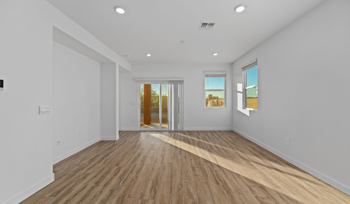 Welcome to The Aloe, a thoughtfully designed new floor plan available at The Oasis at Rocking K by D.R. Horton in Vail, Arizona. Offering 1,310 square feet of efficient and comfortable living space, The Aloe is ideal for those seeking a home that blends functionality, modern style, and everyday ease.  Upon entry, you’re welcomed into an open-concept layout that maximizes every square foot. The large great room serves as the heart of the home and flows seamlessly into the dining area and kitchen, perfect for both relaxing and entertaining. The kitchen offers a clean and modern aesthetic with ample storage and workspace.  The Aloe features three well-proportioned bedrooms designed for comfort and flexibility. The private primary suite is tucked away at the rear of the home and includes a walk-in closet and en-suite bathroom. Two additional bedrooms are located near the front of the home.  Designed with convenience in mind, the home includes a utility room near the kitchen, offering easy access to laundry and additional storage.  Step outside to a spacious backyard, where you can unwind and enjoy Vail’s beautiful weather year-round. Whether you’re sipping your morning coffee or hosting a weekend barbecue, this outdoor space serene surroundings of Rocking K.  Additionally, The Aloe is equipped with D.R. Horton’s Home is Connected Smart Home package, which includes a smart thermostat, video doorbell, keyless entry, and Wi-Fi® enabled garage door opener!  Living in Rocking K offers a variety of amenities, including playgrounds with jungle gyms, parks, ramadas, and walking and biking trails that encourage a healthy, active lifestyle. Designed with energy efficiency in mind, The Aloe at The Oasis at Rocking K is an Energy Ready Home, helping to lower utility costs, offering you long-term savings, and a sustainable living environment.  *Images shown are for reference only. They depict The Aloe spec home and may not represent the actual home.