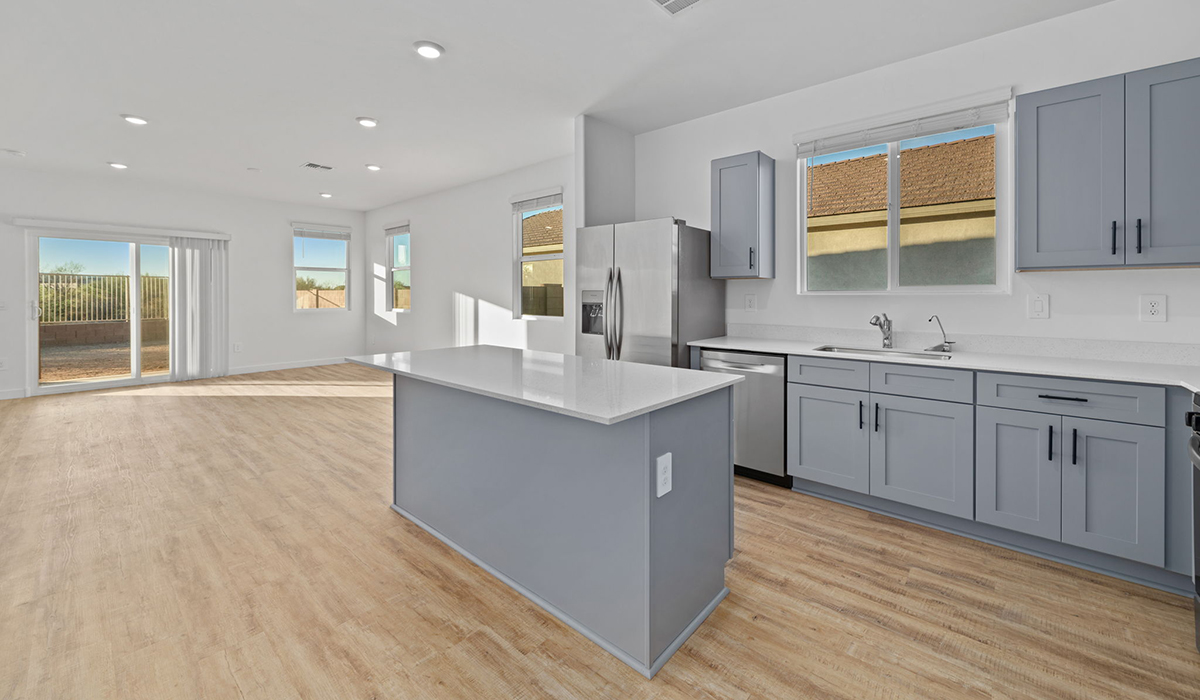 Welcome to The Aloe, a thoughtfully designed new floor plan available at The Oasis at Rocking K by D.R. Horton in Vail, Arizona. Offering 1,310 square feet of efficient and comfortable living space, The Aloe is ideal for those seeking a home that blends functionality, modern style, and everyday ease.  Upon entry, you’re welcomed into an open-concept layout that maximizes every square foot. The large great room serves as the heart of the home and flows seamlessly into the dining area and kitchen, perfect for both relaxing and entertaining. The kitchen offers a clean and modern aesthetic with ample storage and workspace.  The Aloe features three well-proportioned bedrooms designed for comfort and flexibility. The private primary suite is tucked away at the rear of the home and includes a walk-in closet and en-suite bathroom. Two additional bedrooms are located near the front of the home.  Designed with convenience in mind, the home includes a utility room near the kitchen, offering easy access to laundry and additional storage.  Step outside to a spacious backyard, where you can unwind and enjoy Vail’s beautiful weather year-round. Whether you’re sipping your morning coffee or hosting a weekend barbecue, this outdoor space serene surroundings of Rocking K.  Additionally, The Aloe is equipped with D.R. Horton’s Home is Connected Smart Home package, which includes a smart thermostat, video doorbell, keyless entry, and Wi-Fi® enabled garage door opener!  Living in Rocking K offers a variety of amenities, including playgrounds with jungle gyms, parks, ramadas, and walking and biking trails that encourage a healthy, active lifestyle. Designed with energy efficiency in mind, The Aloe at The Oasis at Rocking K is an Energy Ready Home, helping to lower utility costs, offering you long-term savings, and a sustainable living environment.  *Images shown are for reference only. They depict The Aloe spec home and may not represent the actual home.