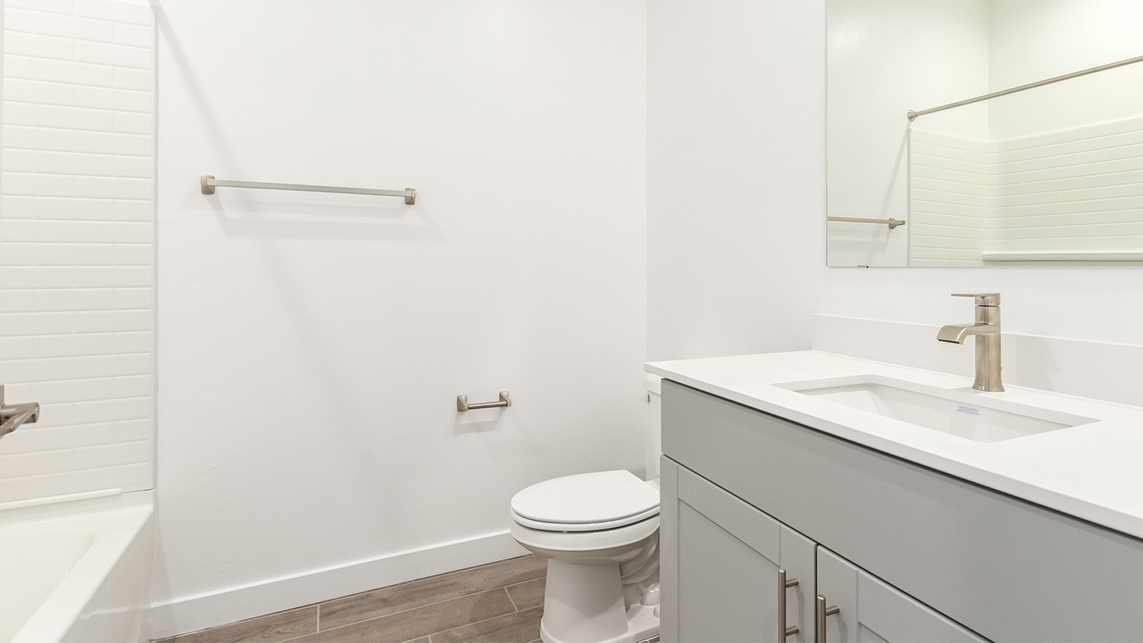 Explore The Baxter at The Oasis at Rocking K in Vail, Arizona, a meticulously designed single-story new home floorplan offering 1,423 square feet of beautifully appointed living space.  As you step inside, you'll immediately appreciate the open and inviting layout that seamlessly connects the great room, dining area, and kitchen. The heart of the home, the kitchen, is equipped with sleek stainless-steel appliances, including a built-in microwave and gas range. The central island with a breakfast bar serves as a gathering spot for casual meals and entertaining.  The adjacent dining room flows effortlessly into a covered patio, perfect for extending your living space outdoors. The great room, with its large windows, allows natural light to flood the space, creating a warm and welcoming atmosphere.  The primary suite is a private hideaway, featuring a spacious walk-in closet and an en-suite bathroom. Two additional bedrooms are located near the front of the home, offering ample space and privacy for family members or guests. These rooms share a well-appointed full bathroom.  Additional standard features of The Baxter include energy-efficient dual-pane windows, a tankless water heater, and smart home technology that allows you to control the thermostat, lighting, and security system from your smartphone. The home also comes with a fully landscaped front yard with automatic drip irrigation, ensuring your home looks beautiful with minimal effort.  The two-car garage, utility room with washer/dryer hookups, and abundant storage throughout the home make the Baxter not only stylish but incredibly functional, catering to the needs of modern living.  The Baxter at The Oasis at Rocking K is where thoughtful design meets convenience, making it the perfect home for those seeking a blend of comfort, style, and functionality.