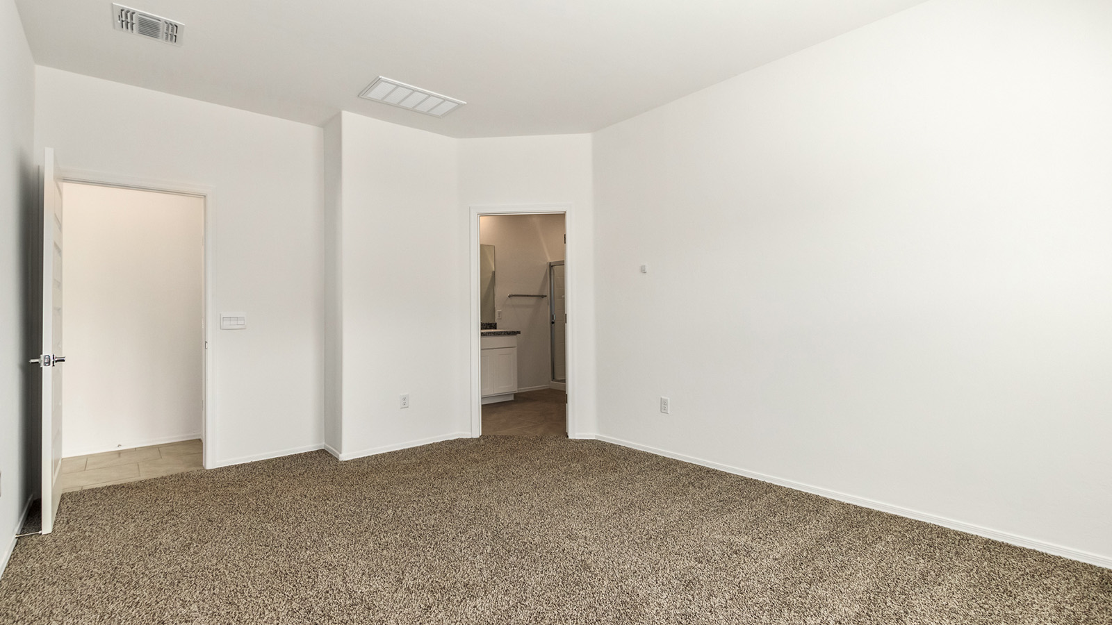 The Dalton at The Oasis at Rocking K presents an exceptional living experience that blends comfort and style within its thoughtfully crafted 1,569 square feet. This one-story, four-bedroom, two-bathroom home is designed to cater to a variety of lifestyle needs, offering both privacy and open spaces that encourage togetherness. As you step into the welcoming entryway, you're led into a spacious great room that seamlessly connects with the dining room and kitchen, creating a perfect setting for daily living and entertaining. The kitchen is a true culinary delight, featuring elegant quartz countertops, 42” shaker-style cabinets, and a modern layout that includes a pantry for additional storage.  The primary suite, located at the rear of the home, serves as a private oasis with a walk-in closet and a luxurious bathroom, complete with dual sinks and high-quality fixtures. The additional three bedrooms are positioned towards the front of the home, providing ample space for family, guests, or a home office setup. Each bedroom is well-proportioned, offering comfort and flexibility in their use.  The Dalton also features a covered patio, ideal for outdoor dining and relaxation, where you can enjoy the breathtaking views and Arizona sunsets that The Oasis at Rocking K is known for. The home includes a two-car garage, providing ample storage and parking space. Additionally, the front yard is meticulously landscaped with auto drip irrigation, ensuring your home’s curb appeal remains pristine year-round.  Living in The Oasis at Rocking K means enjoying a community filled with modern conveniences and natural beauty. Each home, including The Dalton, is equipped with D.R. Horton’s Home is Connected® Smart Home package, ensuring you have the latest in home automation technology. With additional energy-efficient features like spray foam insulation, a tankless water heater, and LED lighting, The Dalton is designed to offer long-term savings and environmental sustainability.  This home isn’t just a place to live; it’s part of a vibrant community where residents can take advantage of amenities such as walking trails, playgrounds, and community events that foster a strong sense of connection among neighbors. The Dalton at The Oasis at Rocking K isn’t just a house—it’s a home where memories are made and a fulfilling lifestyle awaits.