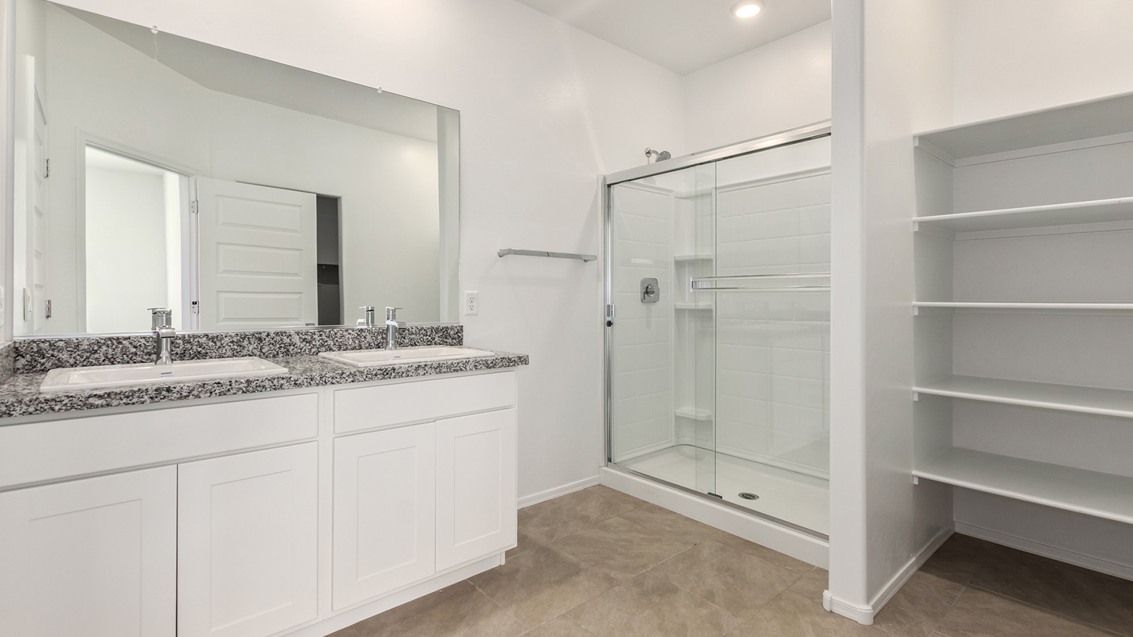 The Dalton at The Oasis at Rocking K presents an exceptional living experience that blends comfort and style within its thoughtfully crafted 1,569 square feet. This one-story, four-bedroom, two-bathroom home is designed to cater to a variety of lifestyle needs, offering both privacy and open spaces that encourage togetherness. As you step into the welcoming entryway, you're led into a spacious great room that seamlessly connects with the dining room and kitchen, creating a perfect setting for daily living and entertaining. The kitchen is a true culinary delight, featuring elegant quartz countertops, 42” shaker-style cabinets, and a modern layout that includes a pantry for additional storage.  The primary suite, located at the rear of the home, serves as a private oasis with a walk-in closet and a luxurious bathroom, complete with dual sinks and high-quality fixtures. The additional three bedrooms are positioned towards the front of the home, providing ample space for family, guests, or a home office setup. Each bedroom is well-proportioned, offering comfort and flexibility in their use.  The Dalton also features a covered patio, ideal for outdoor dining and relaxation, where you can enjoy the breathtaking views and Arizona sunsets that The Oasis at Rocking K is known for. The home includes a two-car garage, providing ample storage and parking space. Additionally, the front yard is meticulously landscaped with auto drip irrigation, ensuring your home’s curb appeal remains pristine year-round.  Living in The Oasis at Rocking K means enjoying a community filled with modern conveniences and natural beauty. Each home, including The Dalton, is equipped with D.R. Horton’s Home is Connected® Smart Home package, ensuring you have the latest in home automation technology. With additional energy-efficient features like spray foam insulation, a tankless water heater, and LED lighting, The Dalton is designed to offer long-term savings and environmental sustainability.  This home isn’t just a place to live; it’s part of a vibrant community where residents can take advantage of amenities such as walking trails, playgrounds, and community events that foster a strong sense of connection among neighbors. The Dalton at The Oasis at Rocking K isn’t just a house—it’s a home where memories are made and a fulfilling lifestyle awaits.