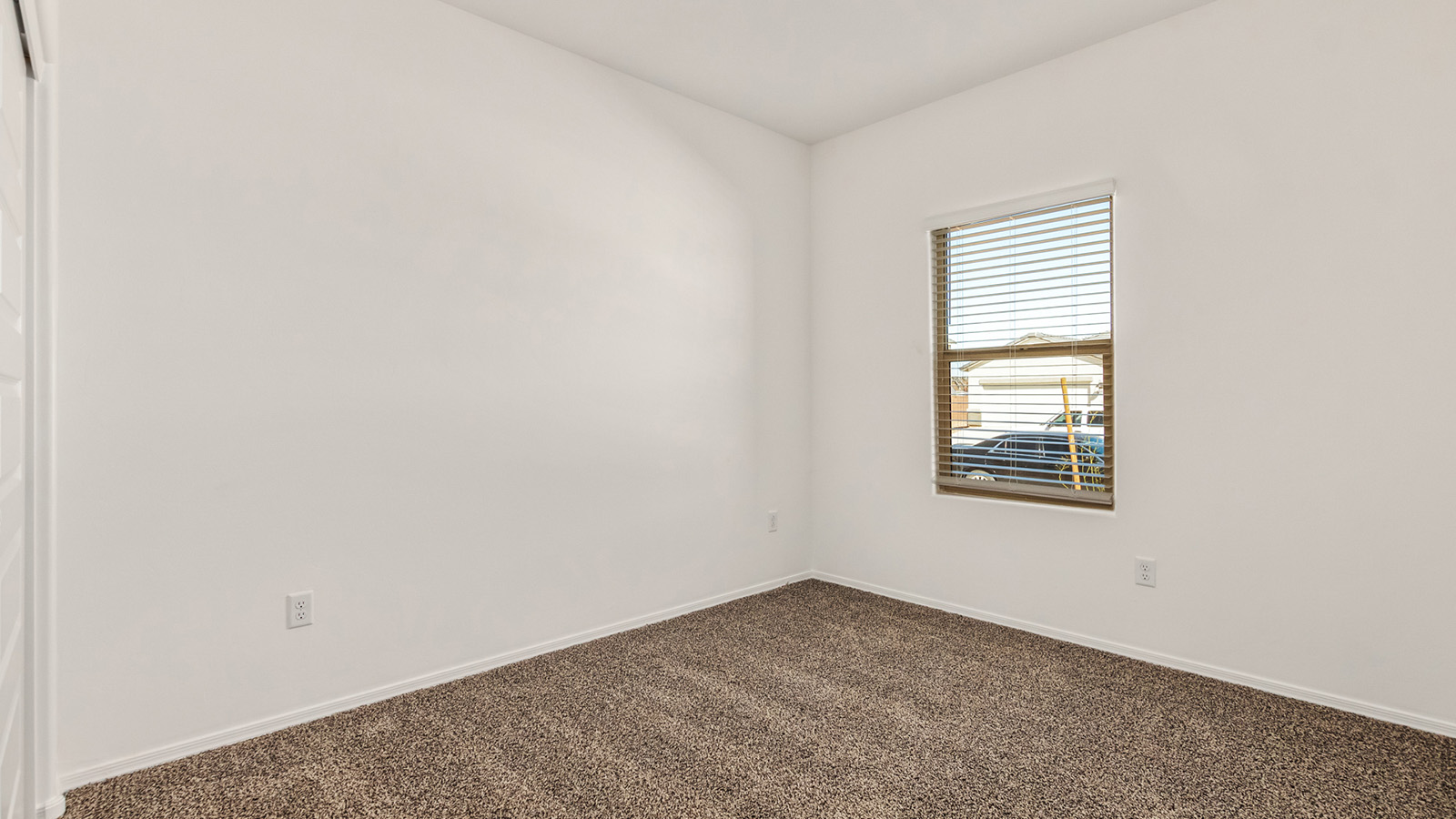 The Dalton at The Oasis at Rocking K presents an exceptional living experience that blends comfort and style within its thoughtfully crafted 1,569 square feet. This one-story, four-bedroom, two-bathroom home is designed to cater to a variety of lifestyle needs, offering both privacy and open spaces that encourage togetherness. As you step into the welcoming entryway, you're led into a spacious great room that seamlessly connects with the dining room and kitchen, creating a perfect setting for daily living and entertaining. The kitchen is a true culinary delight, featuring elegant quartz countertops, 42” shaker-style cabinets, and a modern layout that includes a pantry for additional storage.  The primary suite, located at the rear of the home, serves as a private oasis with a walk-in closet and a luxurious bathroom, complete with dual sinks and high-quality fixtures. The additional three bedrooms are positioned towards the front of the home, providing ample space for family, guests, or a home office setup. Each bedroom is well-proportioned, offering comfort and flexibility in their use.  The Dalton also features a covered patio, ideal for outdoor dining and relaxation, where you can enjoy the breathtaking views and Arizona sunsets that The Oasis at Rocking K is known for. The home includes a two-car garage, providing ample storage and parking space. Additionally, the front yard is meticulously landscaped with auto drip irrigation, ensuring your home’s curb appeal remains pristine year-round.  Living in The Oasis at Rocking K means enjoying a community filled with modern conveniences and natural beauty. Each home, including The Dalton, is equipped with D.R. Horton’s Home is Connected® Smart Home package, ensuring you have the latest in home automation technology. With additional energy-efficient features like spray foam insulation, a tankless water heater, and LED lighting, The Dalton is designed to offer long-term savings and environmental sustainability.  This home isn’t just a place to live; it’s part of a vibrant community where residents can take advantage of amenities such as walking trails, playgrounds, and community events that foster a strong sense of connection among neighbors. The Dalton at The Oasis at Rocking K isn’t just a house—it’s a home where memories are made and a fulfilling lifestyle awaits.