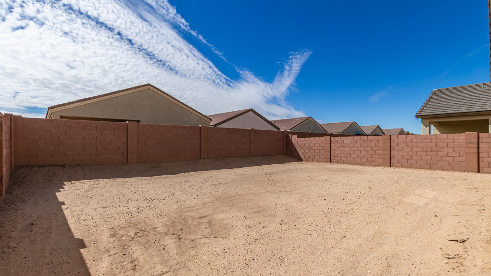 The Dalton at The Oasis at Rocking K presents an exceptional living experience that blends comfort and style within its thoughtfully crafted 1,569 square feet. This one-story, four-bedroom, two-bathroom home is designed to cater to a variety of lifestyle needs, offering both privacy and open spaces that encourage togetherness. As you step into the welcoming entryway, you're led into a spacious great room that seamlessly connects with the dining room and kitchen, creating a perfect setting for daily living and entertaining. The kitchen is a true culinary delight, featuring elegant quartz countertops, 42” shaker-style cabinets, and a modern layout that includes a pantry for additional storage.  The primary suite, located at the rear of the home, serves as a private oasis with a walk-in closet and a luxurious bathroom, complete with dual sinks and high-quality fixtures. The additional three bedrooms are positioned towards the front of the home, providing ample space for family, guests, or a home office setup. Each bedroom is well-proportioned, offering comfort and flexibility in their use.  The Dalton also features a covered patio, ideal for outdoor dining and relaxation, where you can enjoy the breathtaking views and Arizona sunsets that The Oasis at Rocking K is known for. The home includes a two-car garage, providing ample storage and parking space. Additionally, the front yard is meticulously landscaped with auto drip irrigation, ensuring your home’s curb appeal remains pristine year-round.  Living in The Oasis at Rocking K means enjoying a community filled with modern conveniences and natural beauty. Each home, including The Dalton, is equipped with D.R. Horton’s Home is Connected® Smart Home package, ensuring you have the latest in home automation technology. With additional energy-efficient features like spray foam insulation, a tankless water heater, and LED lighting, The Dalton is designed to offer long-term savings and environmental sustainability.  This home isn’t just a place to live; it’s part of a vibrant community where residents can take advantage of amenities such as walking trails, playgrounds, and community events that foster a strong sense of connection among neighbors. The Dalton at The Oasis at Rocking K isn’t just a house—it’s a home where memories are made and a fulfilling lifestyle awaits.