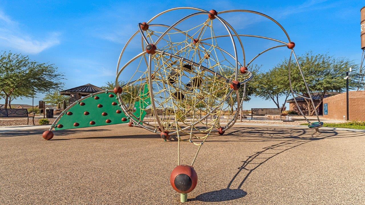 The Dalton at The Oasis at Rocking K presents an exceptional living experience that blends comfort and style within its thoughtfully crafted 1,569 square feet. This one-story, four-bedroom, two-bathroom home is designed to cater to a variety of lifestyle needs, offering both privacy and open spaces that encourage togetherness. As you step into the welcoming entryway, you're led into a spacious great room that seamlessly connects with the dining room and kitchen, creating a perfect setting for daily living and entertaining. The kitchen is a true culinary delight, featuring elegant quartz countertops, 42” shaker-style cabinets, and a modern layout that includes a pantry for additional storage.  The primary suite, located at the rear of the home, serves as a private oasis with a walk-in closet and a luxurious bathroom, complete with dual sinks and high-quality fixtures. The additional three bedrooms are positioned towards the front of the home, providing ample space for family, guests, or a home office setup. Each bedroom is well-proportioned, offering comfort and flexibility in their use.  The Dalton also features a covered patio, ideal for outdoor dining and relaxation, where you can enjoy the breathtaking views and Arizona sunsets that The Oasis at Rocking K is known for. The home includes a two-car garage, providing ample storage and parking space. Additionally, the front yard is meticulously landscaped with auto drip irrigation, ensuring your home’s curb appeal remains pristine year-round.  Living in The Oasis at Rocking K means enjoying a community filled with modern conveniences and natural beauty. Each home, including The Dalton, is equipped with D.R. Horton’s Home is Connected® Smart Home package, ensuring you have the latest in home automation technology. With additional energy-efficient features like spray foam insulation, a tankless water heater, and LED lighting, The Dalton is designed to offer long-term savings and environmental sustainability.  This home isn’t just a place to live; it’s part of a vibrant community where residents can take advantage of amenities such as walking trails, playgrounds, and community events that foster a strong sense of connection among neighbors. The Dalton at The Oasis at Rocking K isn’t just a house—it’s a home where memories are made and a fulfilling lifestyle awaits.