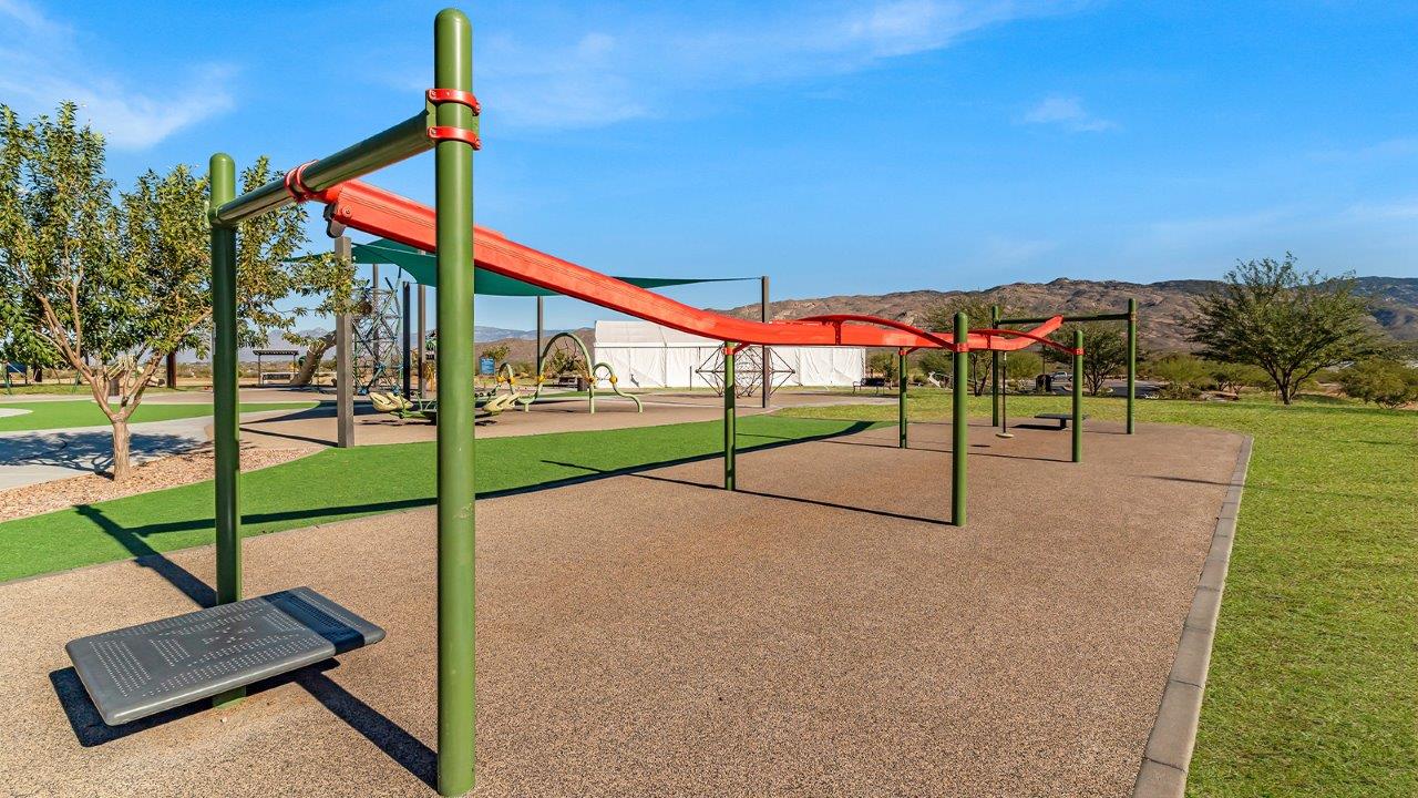 The Dalton at The Oasis at Rocking K presents an exceptional living experience that blends comfort and style within its thoughtfully crafted 1,569 square feet. This one-story, four-bedroom, two-bathroom home is designed to cater to a variety of lifestyle needs, offering both privacy and open spaces that encourage togetherness. As you step into the welcoming entryway, you're led into a spacious great room that seamlessly connects with the dining room and kitchen, creating a perfect setting for daily living and entertaining. The kitchen is a true culinary delight, featuring elegant quartz countertops, 42” shaker-style cabinets, and a modern layout that includes a pantry for additional storage.  The primary suite, located at the rear of the home, serves as a private oasis with a walk-in closet and a luxurious bathroom, complete with dual sinks and high-quality fixtures. The additional three bedrooms are positioned towards the front of the home, providing ample space for family, guests, or a home office setup. Each bedroom is well-proportioned, offering comfort and flexibility in their use.  The Dalton also features a covered patio, ideal for outdoor dining and relaxation, where you can enjoy the breathtaking views and Arizona sunsets that The Oasis at Rocking K is known for. The home includes a two-car garage, providing ample storage and parking space. Additionally, the front yard is meticulously landscaped with auto drip irrigation, ensuring your home’s curb appeal remains pristine year-round.  Living in The Oasis at Rocking K means enjoying a community filled with modern conveniences and natural beauty. Each home, including The Dalton, is equipped with D.R. Horton’s Home is Connected® Smart Home package, ensuring you have the latest in home automation technology. With additional energy-efficient features like spray foam insulation, a tankless water heater, and LED lighting, The Dalton is designed to offer long-term savings and environmental sustainability.  This home isn’t just a place to live; it’s part of a vibrant community where residents can take advantage of amenities such as walking trails, playgrounds, and community events that foster a strong sense of connection among neighbors. The Dalton at The Oasis at Rocking K isn’t just a house—it’s a home where memories are made and a fulfilling lifestyle awaits.