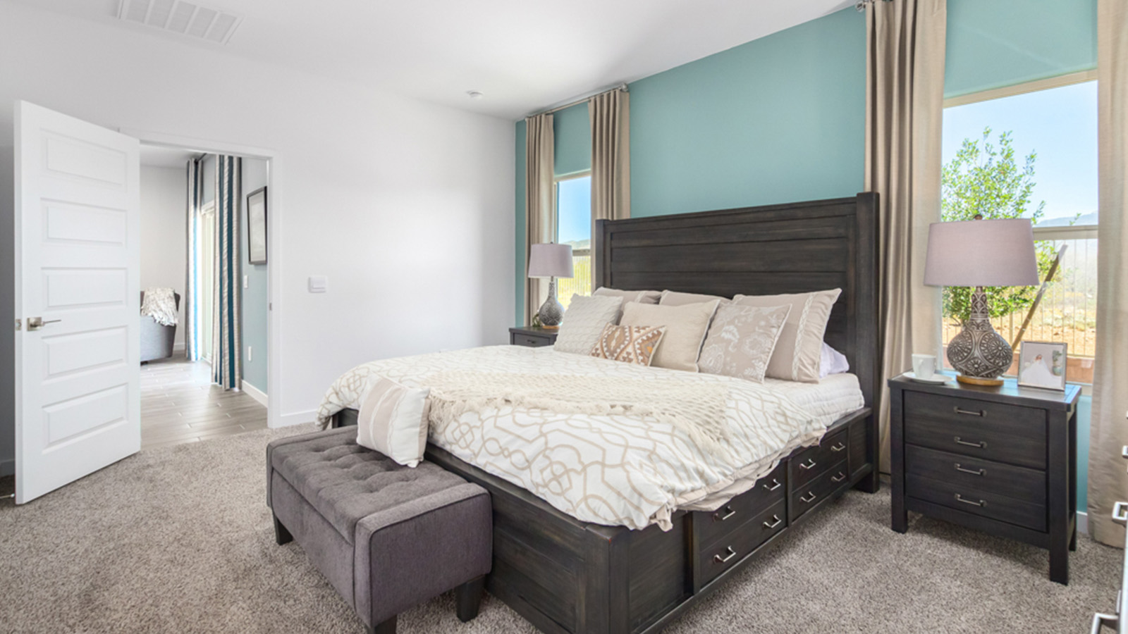 Welcome to The Gaven plan, a spacious single-story new home at The Oasis at Rocking K, where modern living meets the serene beauty of the Arizona landscape. This thoughtfully crafted residence offers 1,815 square feet of well-designed living space, featuring four bedrooms and two full bathrooms, perfect for families who value both comfort and style.  As you step through the front door, you’ll be greeted by a bright and airy entryway that seamlessly transitions into the heart of the home. The open layout connects the great room, dining area, and kitchen, creating an ideal environment for both everyday living and entertaining. The kitchen is a culinary haven, equipped with state-of-the-art appliances, a spacious pantry, and elegant quartz countertops that extend to a large island, perfect for meal prep or casual dining.  The primary suite, nestled at the rear of the home, offers a peaceful retreat with a generously sized walk-in closet and a luxurious en-suite bathroom. The additional three bedrooms are strategically placed to provide privacy and convenience, making them perfect for children, guests, or even a home office. Outside, the covered patio extends your living space, ideal for enjoying Arizona’s stunning sunsets. The front yard is fully landscaped and equipped with an auto drip irrigation system, ensuring your home’s curb appeal is maintained with ease.  Each home at The Oasis at Rocking K, including The Gaven plan, is outfitted with D.R. Horton’s Home is Connected® Smart Home package, featuring a smart thermostat, video doorbell, keyless entry, and Wi-Fi-enabled garage door opener. Energy efficiency is a cornerstone of the design, with features like spray foam insulation, tankless water heaters, and LED lighting, all contributing to long-term savings and environmental sustainability.  The Oasis at Rocking K isn’t just a place to live; it’s a vibrant community with a wealth of amenities, from scenic walking trails to sports courts and playgrounds, ensuring that there’s always something for everyone. Embrace the lifestyle you’ve always dreamed of in The Gaven plan—a perfect blend of comfort, convenience, and Arizona charm.  *Images shown are for reference only. They depict the Gaven model home and may not represent the actual home.