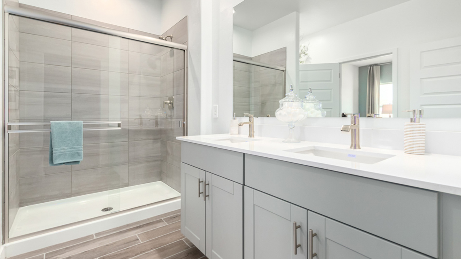 Welcome to The Gaven plan, a spacious single-story new home at The Oasis at Rocking K, where modern living meets the serene beauty of the Arizona landscape. This thoughtfully crafted residence offers 1,815 square feet of well-designed living space, featuring four bedrooms and two full bathrooms, perfect for families who value both comfort and style.  As you step through the front door, you’ll be greeted by a bright and airy entryway that seamlessly transitions into the heart of the home. The open layout connects the great room, dining area, and kitchen, creating an ideal environment for both everyday living and entertaining. The kitchen is a culinary haven, equipped with state-of-the-art appliances, a spacious pantry, and elegant quartz countertops that extend to a large island, perfect for meal prep or casual dining.  The primary suite, nestled at the rear of the home, offers a peaceful retreat with a generously sized walk-in closet and a luxurious en-suite bathroom. The additional three bedrooms are strategically placed to provide privacy and convenience, making them perfect for children, guests, or even a home office. Outside, the covered patio extends your living space, ideal for enjoying Arizona’s stunning sunsets. The front yard is fully landscaped and equipped with an auto drip irrigation system, ensuring your home’s curb appeal is maintained with ease.  Each home at The Oasis at Rocking K, including The Gaven plan, is outfitted with D.R. Horton’s Home is Connected® Smart Home package, featuring a smart thermostat, video doorbell, keyless entry, and Wi-Fi-enabled garage door opener. Energy efficiency is a cornerstone of the design, with features like spray foam insulation, tankless water heaters, and LED lighting, all contributing to long-term savings and environmental sustainability.  The Oasis at Rocking K isn’t just a place to live; it’s a vibrant community with a wealth of amenities, from scenic walking trails to sports courts and playgrounds, ensuring that there’s always something for everyone. Embrace the lifestyle you’ve always dreamed of in The Gaven plan—a perfect blend of comfort, convenience, and Arizona charm.  *Images shown are for reference only. They depict the Gaven model home and may not represent the actual home.