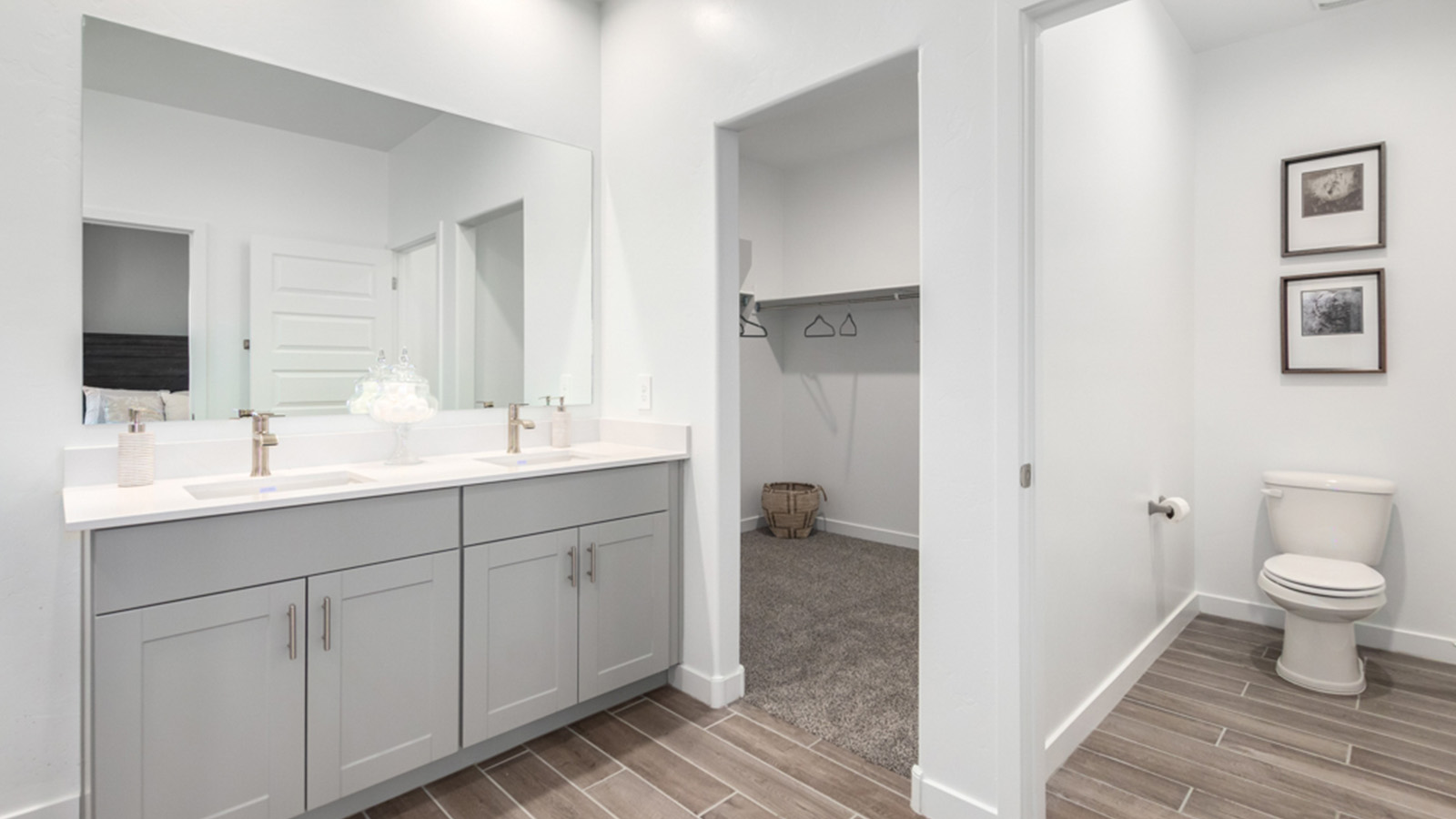 Welcome to The Gaven plan, a spacious single-story new home at The Oasis at Rocking K, where modern living meets the serene beauty of the Arizona landscape. This thoughtfully crafted residence offers 1,815 square feet of well-designed living space, featuring four bedrooms and two full bathrooms, perfect for families who value both comfort and style.  As you step through the front door, you’ll be greeted by a bright and airy entryway that seamlessly transitions into the heart of the home. The open layout connects the great room, dining area, and kitchen, creating an ideal environment for both everyday living and entertaining. The kitchen is a culinary haven, equipped with state-of-the-art appliances, a spacious pantry, and elegant quartz countertops that extend to a large island, perfect for meal prep or casual dining.  The primary suite, nestled at the rear of the home, offers a peaceful retreat with a generously sized walk-in closet and a luxurious en-suite bathroom. The additional three bedrooms are strategically placed to provide privacy and convenience, making them perfect for children, guests, or even a home office. Outside, the covered patio extends your living space, ideal for enjoying Arizona’s stunning sunsets. The front yard is fully landscaped and equipped with an auto drip irrigation system, ensuring your home’s curb appeal is maintained with ease.  Each home at The Oasis at Rocking K, including The Gaven plan, is outfitted with D.R. Horton’s Home is Connected® Smart Home package, featuring a smart thermostat, video doorbell, keyless entry, and Wi-Fi-enabled garage door opener. Energy efficiency is a cornerstone of the design, with features like spray foam insulation, tankless water heaters, and LED lighting, all contributing to long-term savings and environmental sustainability.  The Oasis at Rocking K isn’t just a place to live; it’s a vibrant community with a wealth of amenities, from scenic walking trails to sports courts and playgrounds, ensuring that there’s always something for everyone. Embrace the lifestyle you’ve always dreamed of in The Gaven plan—a perfect blend of comfort, convenience, and Arizona charm.  *Images shown are for reference only. They depict the Gaven model home and may not represent the actual home.