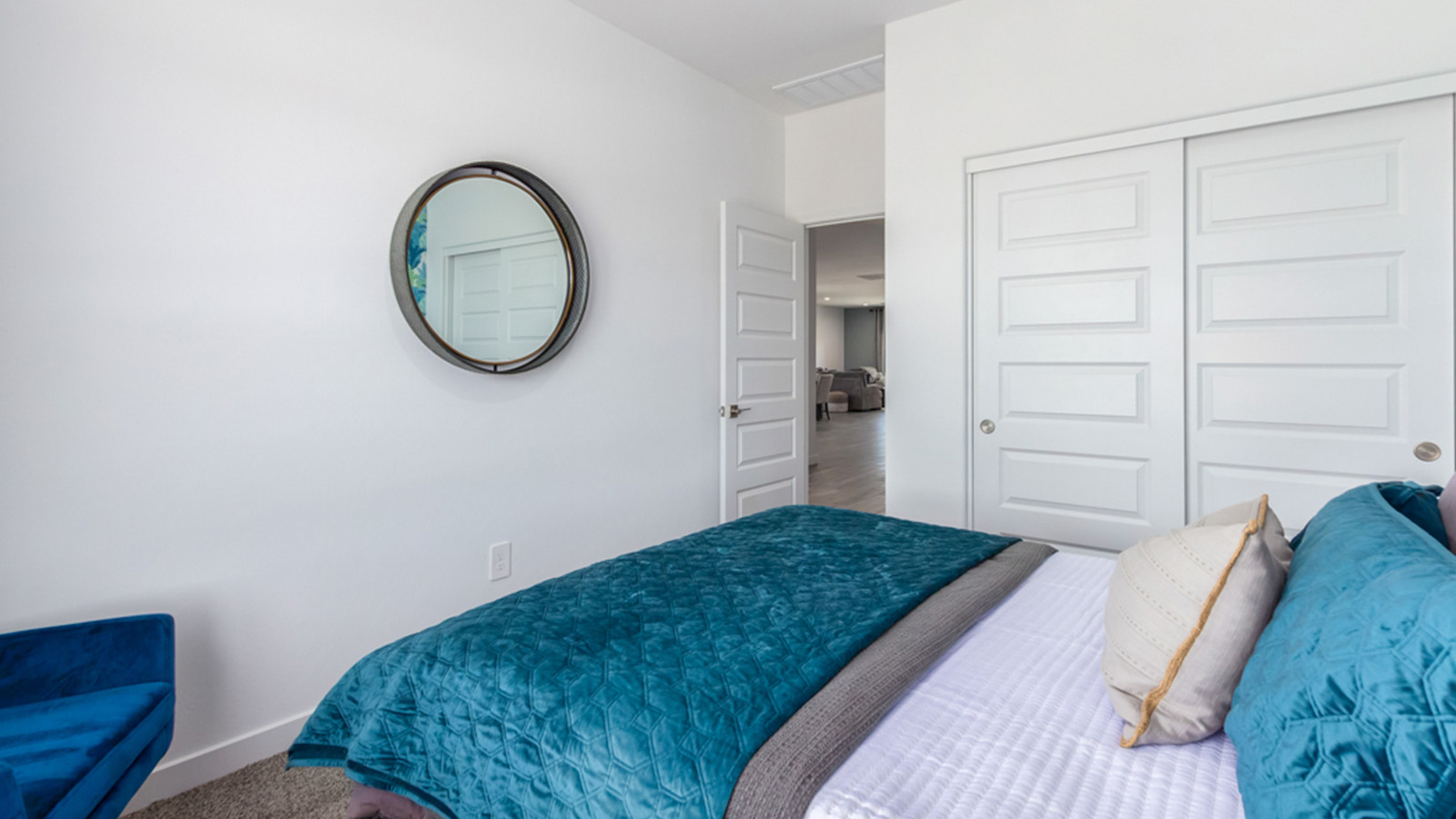 Welcome to The Gaven plan, a spacious single-story new home at The Oasis at Rocking K, where modern living meets the serene beauty of the Arizona landscape. This thoughtfully crafted residence offers 1,815 square feet of well-designed living space, featuring four bedrooms and two full bathrooms, perfect for families who value both comfort and style.  As you step through the front door, you’ll be greeted by a bright and airy entryway that seamlessly transitions into the heart of the home. The open layout connects the great room, dining area, and kitchen, creating an ideal environment for both everyday living and entertaining. The kitchen is a culinary haven, equipped with state-of-the-art appliances, a spacious pantry, and elegant quartz countertops that extend to a large island, perfect for meal prep or casual dining.  The primary suite, nestled at the rear of the home, offers a peaceful retreat with a generously sized walk-in closet and a luxurious en-suite bathroom. The additional three bedrooms are strategically placed to provide privacy and convenience, making them perfect for children, guests, or even a home office. Outside, the covered patio extends your living space, ideal for enjoying Arizona’s stunning sunsets. The front yard is fully landscaped and equipped with an auto drip irrigation system, ensuring your home’s curb appeal is maintained with ease.  Each home at The Oasis at Rocking K, including The Gaven plan, is outfitted with D.R. Horton’s Home is Connected® Smart Home package, featuring a smart thermostat, video doorbell, keyless entry, and Wi-Fi-enabled garage door opener. Energy efficiency is a cornerstone of the design, with features like spray foam insulation, tankless water heaters, and LED lighting, all contributing to long-term savings and environmental sustainability.  The Oasis at Rocking K isn’t just a place to live; it’s a vibrant community with a wealth of amenities, from scenic walking trails to sports courts and playgrounds, ensuring that there’s always something for everyone. Embrace the lifestyle you’ve always dreamed of in The Gaven plan—a perfect blend of comfort, convenience, and Arizona charm.  *Images shown are for reference only. They depict the Gaven model home and may not represent the actual home.