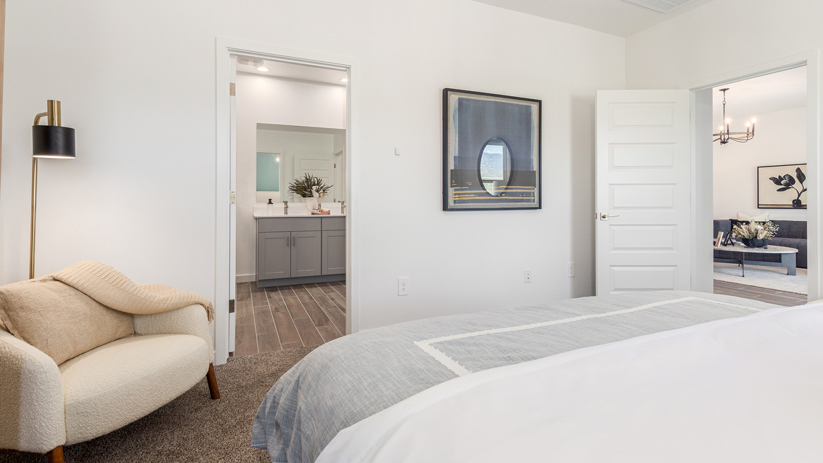 Welcome to The Gaven plan, a spacious single-story new home at The Oasis at Rocking K, where modern living meets the serene beauty of the Arizona landscape. This thoughtfully crafted residence offers 1,815 square feet of well-designed living space, featuring four bedrooms and two full bathrooms, perfect for families who value both comfort and style.  As you step through the front door, you’ll be greeted by a bright and airy entryway that seamlessly transitions into the heart of the home. The open layout connects the great room, dining area, and kitchen, creating an ideal environment for both everyday living and entertaining. The kitchen is a culinary haven, equipped with state-of-the-art appliances, a spacious pantry, and elegant quartz countertops that extend to a large island, perfect for meal prep or casual dining.  The primary suite, nestled at the rear of the home, offers a peaceful retreat with a generously sized walk-in closet and a luxurious en-suite bathroom. The additional three bedrooms are strategically placed to provide privacy and convenience, making them perfect for children, guests, or even a home office. Outside, the covered patio extends your living space, ideal for enjoying Arizona’s stunning sunsets. The front yard is fully landscaped and equipped with an auto drip irrigation system, ensuring your home’s curb appeal is maintained with ease.  Each home at The Oasis at Rocking K, including The Gaven plan, is outfitted with D.R. Horton’s Home is Connected® Smart Home package, featuring a smart thermostat, video doorbell, keyless entry, and Wi-Fi-enabled garage door opener. Energy efficiency is a cornerstone of the design, with features like spray foam insulation, tankless water heaters, and LED lighting, all contributing to long-term savings and environmental sustainability.  The Oasis at Rocking K isn’t just a place to live; it’s a vibrant community with a wealth of amenities, from scenic walking trails to sports courts and playgrounds, ensuring that there’s always something for everyone. Embrace the lifestyle you’ve always dreamed of in The Gaven plan—a perfect blend of comfort, convenience, and Arizona charm.