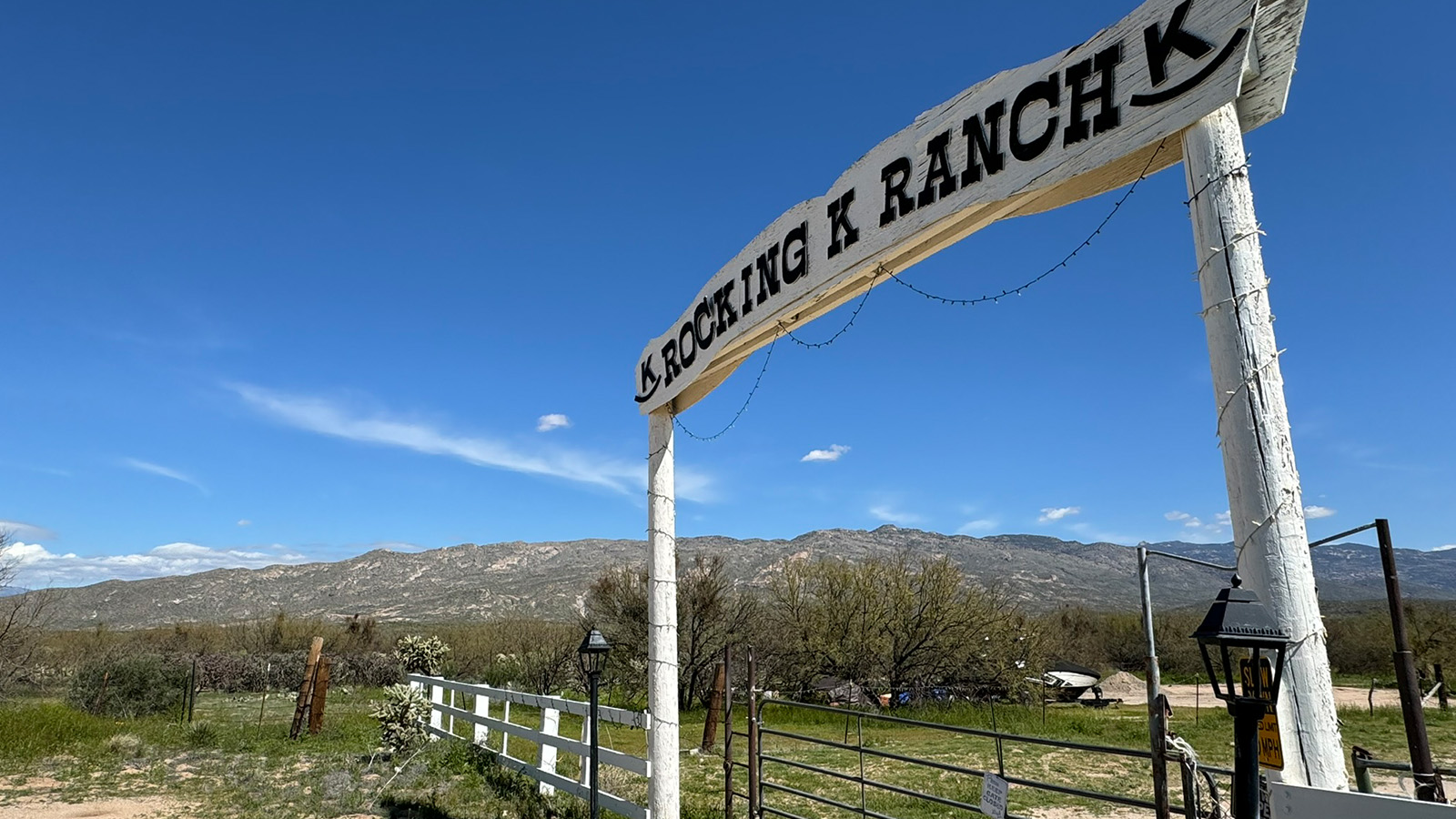 Welcome to The Gaven plan, a spacious single-story new home at The Oasis at Rocking K, where modern living meets the serene beauty of the Arizona landscape. This thoughtfully crafted residence offers 1,815 square feet of well-designed living space, featuring four bedrooms and two full bathrooms, perfect for families who value both comfort and style.  As you step through the front door, you’ll be greeted by a bright and airy entryway that seamlessly transitions into the heart of the home. The open layout connects the great room, dining area, and kitchen, creating an ideal environment for both everyday living and entertaining. The kitchen is a culinary haven, equipped with state-of-the-art appliances, a spacious pantry, and elegant quartz countertops that extend to a large island, perfect for meal prep or casual dining.  The primary suite, nestled at the rear of the home, offers a peaceful retreat with a generously sized walk-in closet and a luxurious en-suite bathroom. The additional three bedrooms are strategically placed to provide privacy and convenience, making them perfect for children, guests, or even a home office. Outside, the covered patio extends your living space, ideal for enjoying Arizona’s stunning sunsets. The front yard is fully landscaped and equipped with an auto drip irrigation system, ensuring your home’s curb appeal is maintained with ease.  Each home at The Oasis at Rocking K, including The Gaven plan, is outfitted with D.R. Horton’s Home is Connected® Smart Home package, featuring a smart thermostat, video doorbell, keyless entry, and Wi-Fi-enabled garage door opener. Energy efficiency is a cornerstone of the design, with features like spray foam insulation, tankless water heaters, and LED lighting, all contributing to long-term savings and environmental sustainability.  The Oasis at Rocking K isn’t just a place to live; it’s a vibrant community with a wealth of amenities, from scenic walking trails to sports courts and playgrounds, ensuring that there’s always something for everyone. Embrace the lifestyle you’ve always dreamed of in The Gaven plan—a perfect blend of comfort, convenience, and Arizona charm.