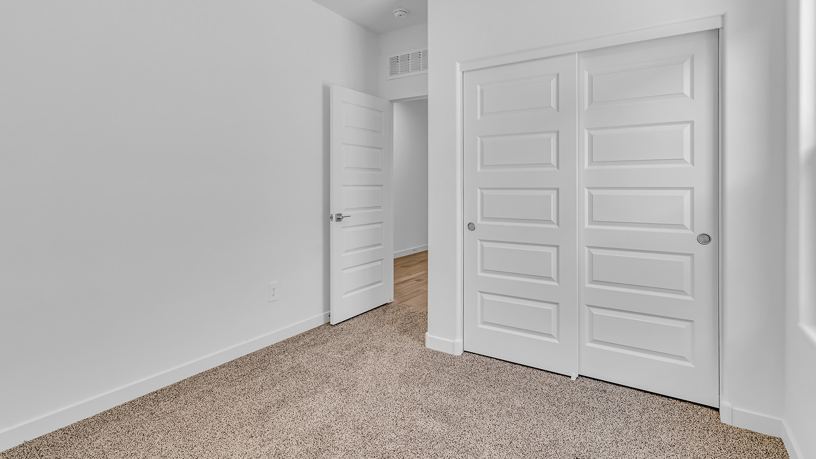 Discover The Harris, a beautifully designed new home at The Oasis at Rocking K, located in the serene surroundings of Vail, Arizona.  This charming one-story new home offers a seamless blend of style, functionality, and comfort, perfect for families and individuals alike. The Harris spans 1,856 square feet and includes four spacious bedrooms, two-and-a-half bathrooms, and a two-car garage, all meticulously crafted to meet the needs of modern living.  The exterior of The Harris offers three elevation options, each featuring D.R. Horton’s signature Spanish lace stucco, tile roofs, and professionally landscaped front yards with auto drip irrigation, adding to the home’s curb appeal. Inside, you’re greeted by an inviting foyer that leads to an open-concept living area, where the great room flows effortlessly into the dining area and a modern kitchen.  The kitchen is a chef's dream, equipped with top-of-the-line stainless steel appliances, quartz countertops, a large center island, and 42” shaker-style cabinets with stylish cabinet pulls. Adjacent to the kitchen, the dining area is perfect for family meals or entertaining guests. The great room, with its ample natural light and direct access to the covered patio, provides a perfect space for relaxation and gatherings.  The primary bedroom is a private sanctuary located at the back of the home, offering tranquility and easy access to the backyard. It features a walk-in closet and a luxurious en-suite bathroom with dual sinks and a large walk-in shower. The additional three bedrooms are generously sized, with two sharing a well-appointed full bathroom. A powder room, strategically placed near the living areas, adds convenience for guests.  Living at The Oasis at Rocking K means enjoying a variety of amenities, including ramadas, picnic areas, and access to the greater Rocking K master-planned community’s parks, walking trails, recreational facilities and events. Each home in this community also comes equipped with D.R. Horton’s Home is Connected® Smart Home package, offering the latest in modern living with features like a smart thermostat, video doorbell, and more.  Whether you’re looking for a home that offers space, style, or a sense of community, The Harris at The Oasis at Rocking K provides it all in a location that’s close to everything you need in Vail, Arizona.