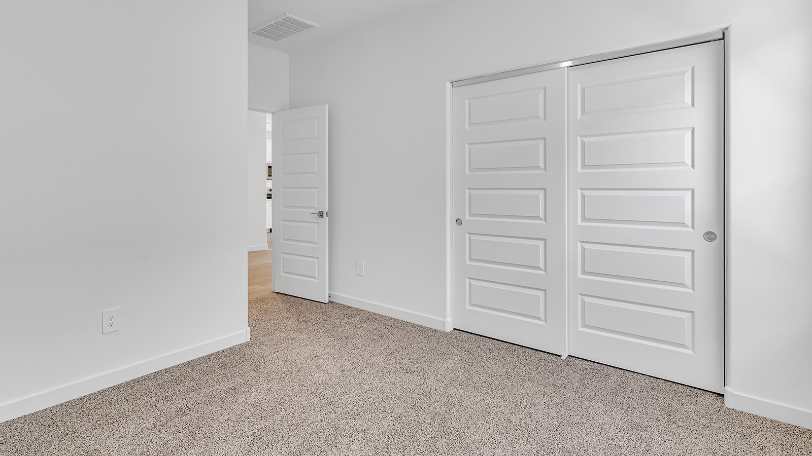 Discover The Harris, a beautifully designed new home at The Oasis at Rocking K, located in the serene surroundings of Vail, Arizona.  This charming one-story new home offers a seamless blend of style, functionality, and comfort, perfect for families and individuals alike. The Harris spans 1,856 square feet and includes four spacious bedrooms, two-and-a-half bathrooms, and a two-car garage, all meticulously crafted to meet the needs of modern living.  The exterior of The Harris offers three elevation options, each featuring D.R. Horton’s signature Spanish lace stucco, tile roofs, and professionally landscaped front yards with auto drip irrigation, adding to the home’s curb appeal. Inside, you’re greeted by an inviting foyer that leads to an open-concept living area, where the great room flows effortlessly into the dining area and a modern kitchen.  The kitchen is a chef's dream, equipped with top-of-the-line stainless steel appliances, quartz countertops, a large center island, and 42” shaker-style cabinets with stylish cabinet pulls. Adjacent to the kitchen, the dining area is perfect for family meals or entertaining guests. The great room, with its ample natural light and direct access to the covered patio, provides a perfect space for relaxation and gatherings.  The primary bedroom is a private sanctuary located at the back of the home, offering tranquility and easy access to the backyard. It features a walk-in closet and a luxurious en-suite bathroom with dual sinks and a large walk-in shower. The additional three bedrooms are generously sized, with two sharing a well-appointed full bathroom. A powder room, strategically placed near the living areas, adds convenience for guests.  Living at The Oasis at Rocking K means enjoying a variety of amenities, including ramadas, picnic areas, and access to the greater Rocking K master-planned community’s parks, walking trails, recreational facilities and events. Each home in this community also comes equipped with D.R. Horton’s Home is Connected® Smart Home package, offering the latest in modern living with features like a smart thermostat, video doorbell, and more.  Whether you’re looking for a home that offers space, style, or a sense of community, The Harris at The Oasis at Rocking K provides it all in a location that’s close to everything you need in Vail, Arizona.