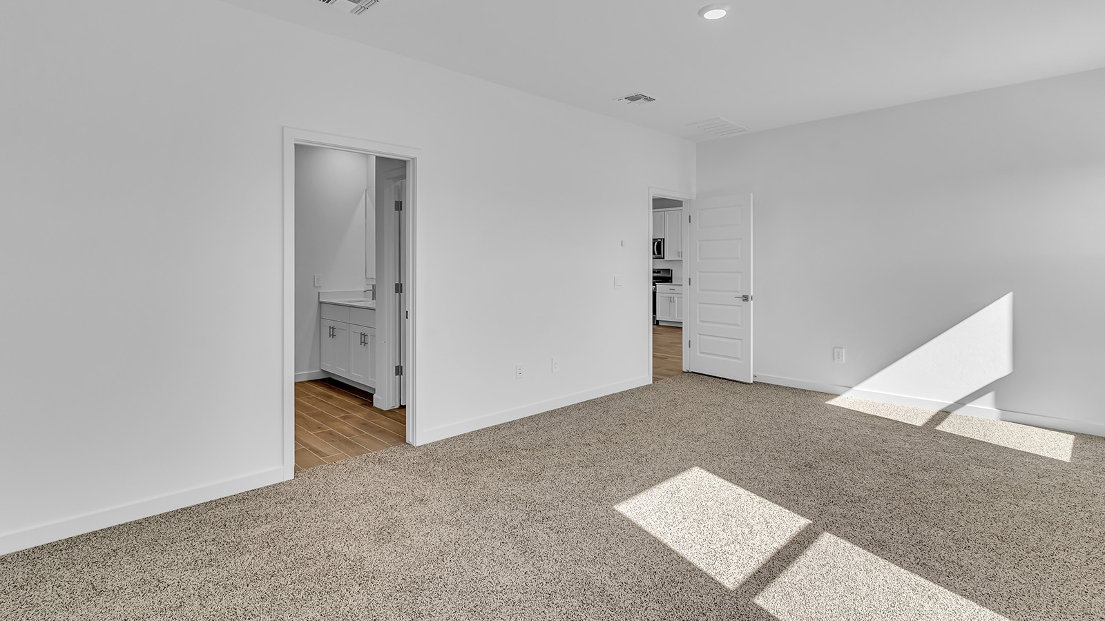 Discover The Harris, a beautifully designed new home at The Oasis at Rocking K, located in the serene surroundings of Vail, Arizona.  This charming one-story new home offers a seamless blend of style, functionality, and comfort, perfect for families and individuals alike. The Harris spans 1,856 square feet and includes four spacious bedrooms, two-and-a-half bathrooms, and a two-car garage, all meticulously crafted to meet the needs of modern living.  The exterior of The Harris offers three elevation options, each featuring D.R. Horton’s signature Spanish lace stucco, tile roofs, and professionally landscaped front yards with auto drip irrigation, adding to the home’s curb appeal. Inside, you’re greeted by an inviting foyer that leads to an open-concept living area, where the great room flows effortlessly into the dining area and a modern kitchen.  The kitchen is a chef's dream, equipped with top-of-the-line stainless steel appliances, quartz countertops, a large center island, and 42” shaker-style cabinets with stylish cabinet pulls. Adjacent to the kitchen, the dining area is perfect for family meals or entertaining guests. The great room, with its ample natural light and direct access to the covered patio, provides a perfect space for relaxation and gatherings.  The primary bedroom is a private sanctuary located at the back of the home, offering tranquility and easy access to the backyard. It features a walk-in closet and a luxurious en-suite bathroom with dual sinks and a large walk-in shower. The additional three bedrooms are generously sized, with two sharing a well-appointed full bathroom. A powder room, strategically placed near the living areas, adds convenience for guests.  Living at The Oasis at Rocking K means enjoying a variety of amenities, including ramadas, picnic areas, and access to the greater Rocking K master-planned community’s parks, walking trails, recreational facilities and events. Each home in this community also comes equipped with D.R. Horton’s Home is Connected® Smart Home package, offering the latest in modern living with features like a smart thermostat, video doorbell, and more.  Whether you’re looking for a home that offers space, style, or a sense of community, The Harris at The Oasis at Rocking K provides it all in a location that’s close to everything you need in Vail, Arizona.